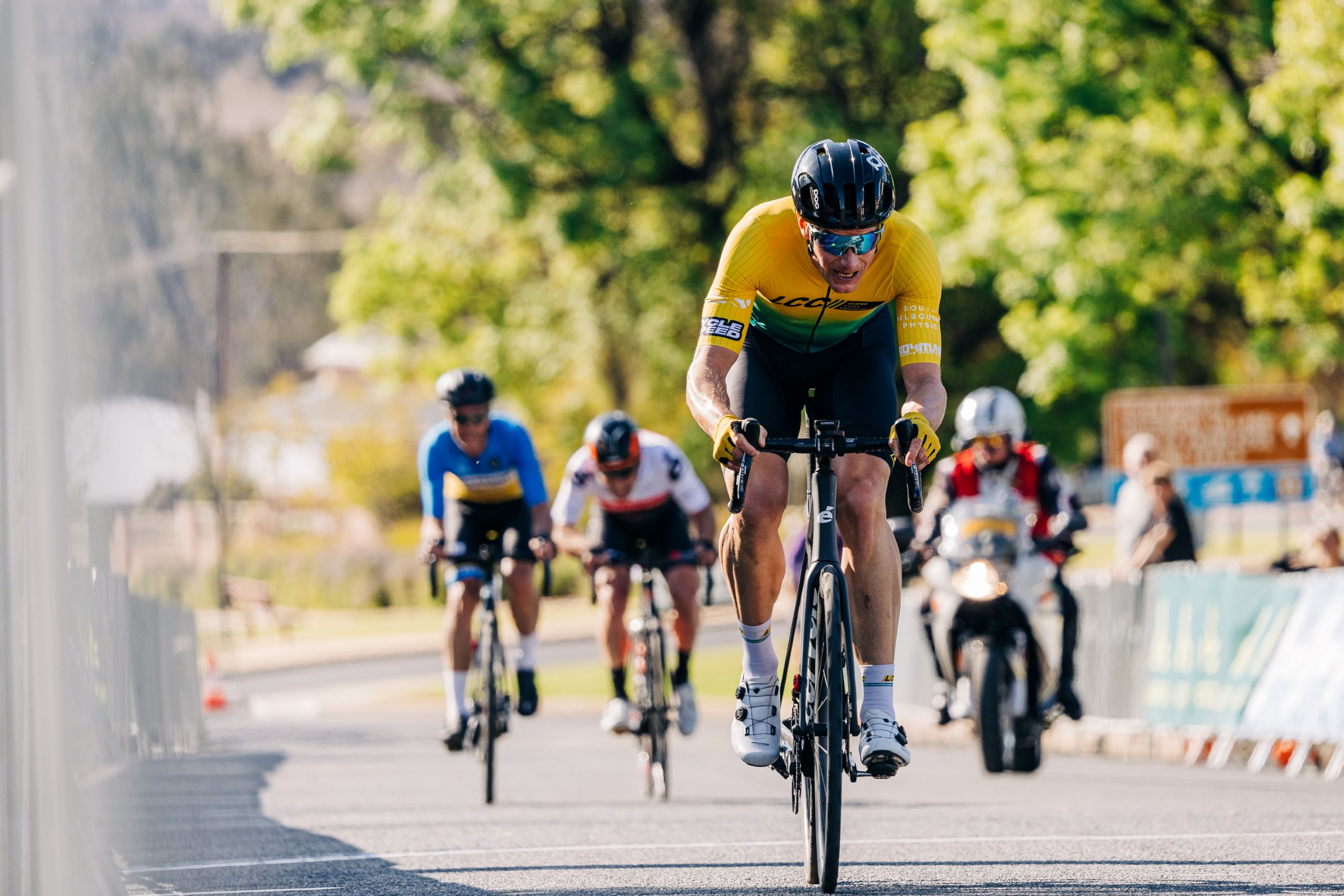 A masters men cyclist attacks up the steep Loxton Kicker climb at the 2024 AusCycling Masters and Junior Road National Championships in Loxton