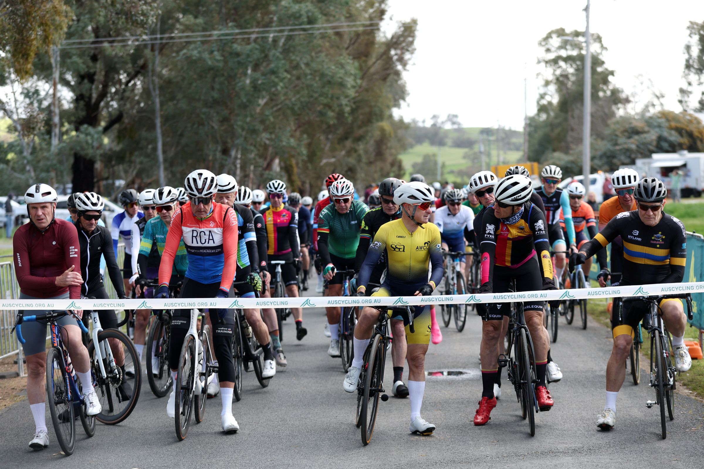 The start line of older master men cyclists during the 2025 AusCycling Junior & Masters Road National Championships in Wagga Wagga
