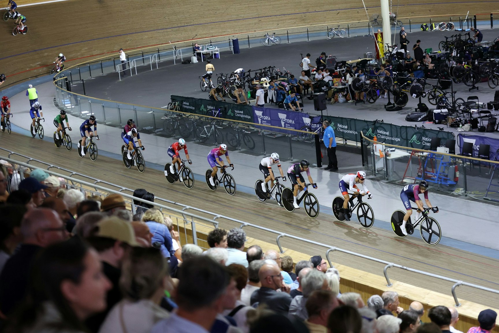 Men racing the 2025 AusCycling Madison National Championships at Joe Ciavola Velodrome (DISC) in Melbourne while crowd watches on. Picture: Con Chronis