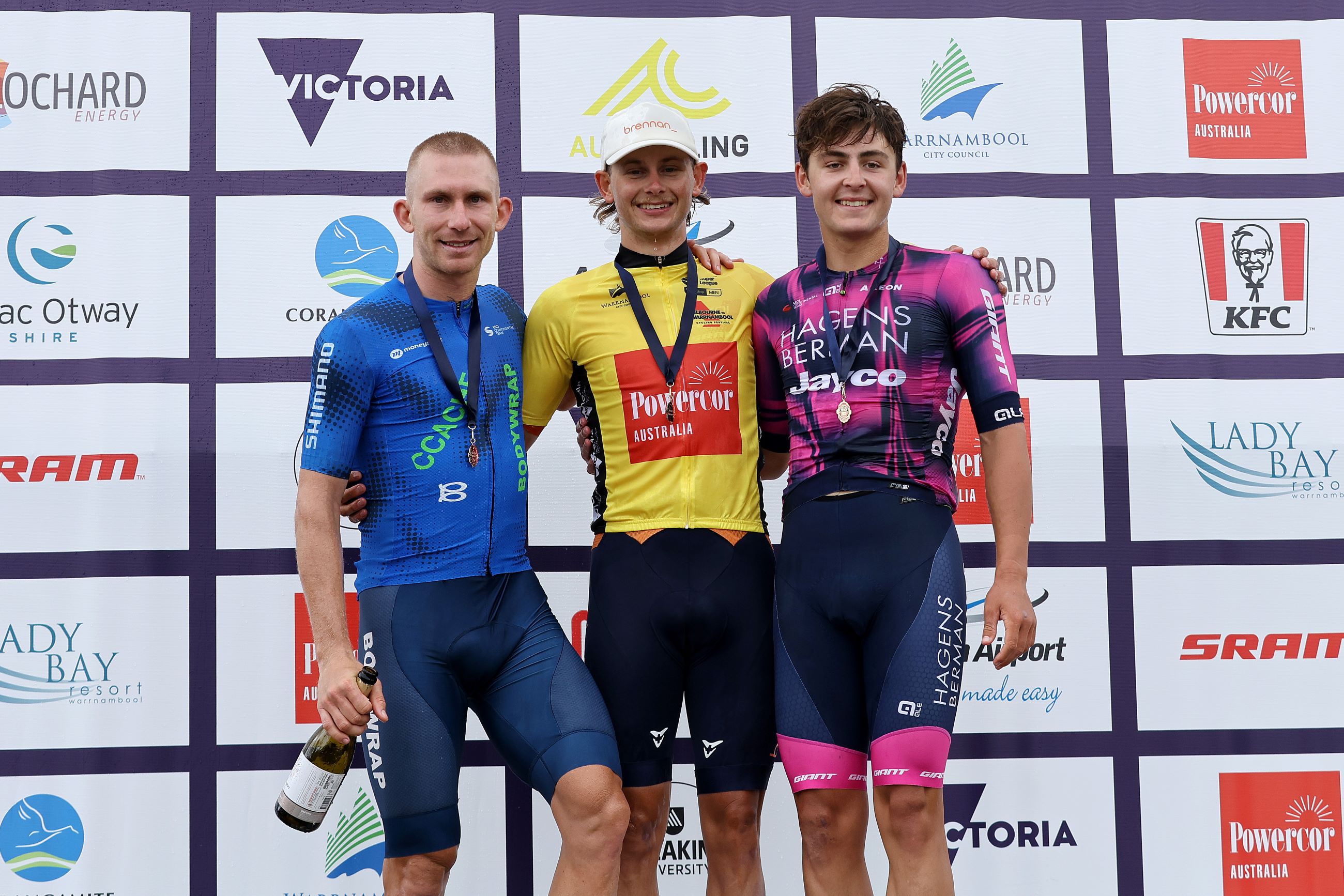 Blake Agnoletto, Cameron Scott and Hamish McKenzie on the podium of the men's 2025 Powercor Melbourne to Warrnambool.