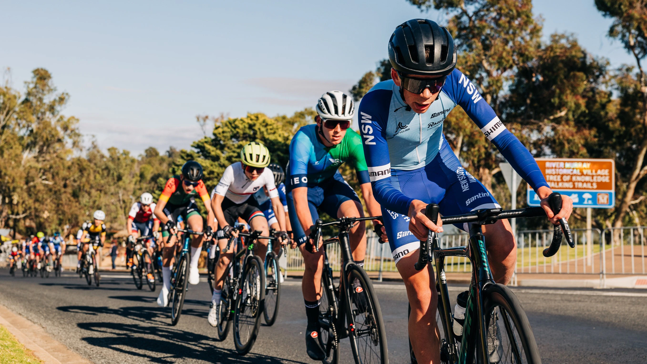 A New South Wales rider (NSW) leads the peloton during the 2024 AusCycling Junior Criterium National Championships in Loxton, South Australia (SA). Photo by James Raison