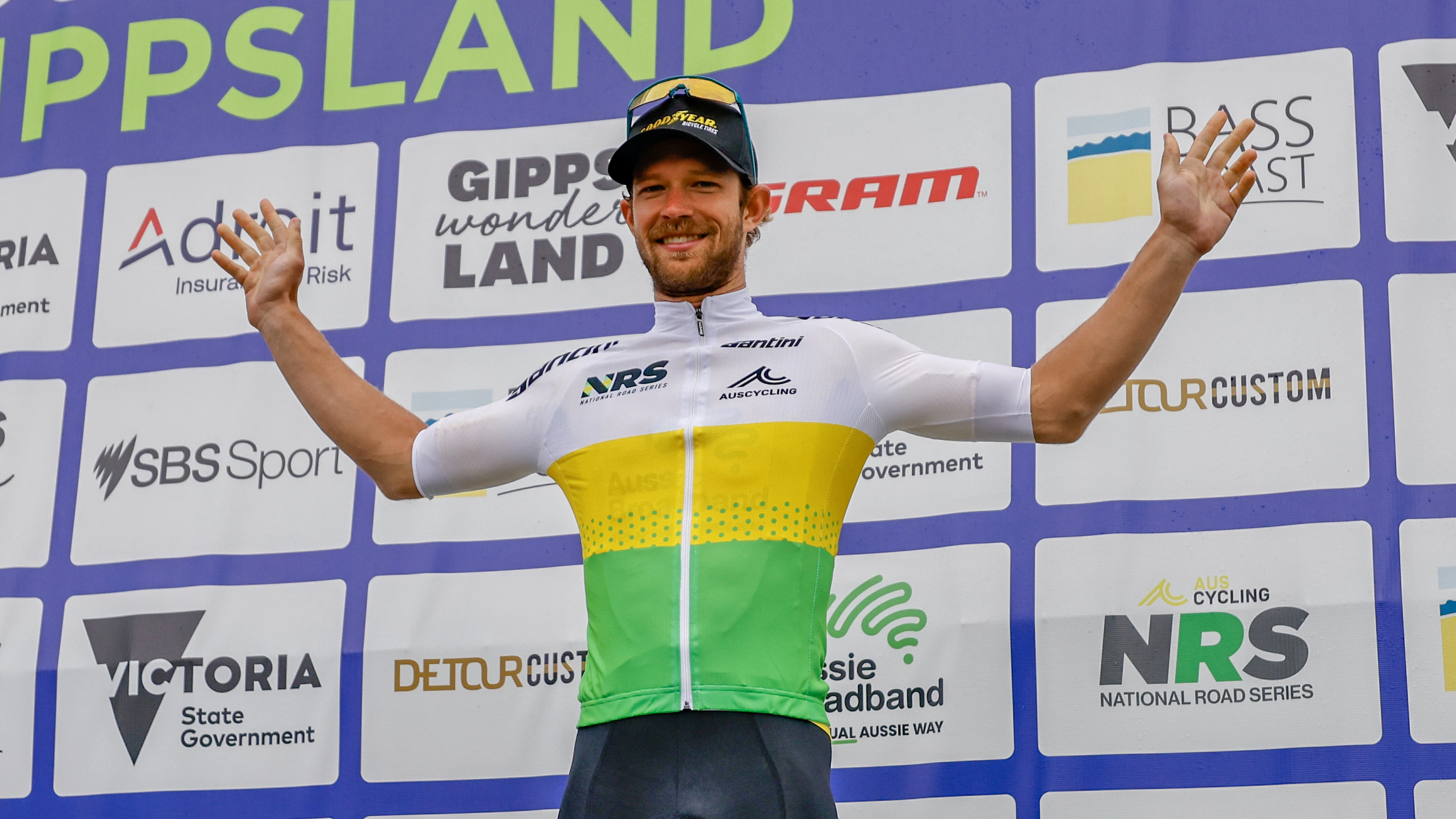 Graeme Frislie of CCACHE x Par Kup, cyclist, on the podium of the 2024 AusCycling National Road Series as leader and winner of the NRS individual classification at the Tour of Gippsland.