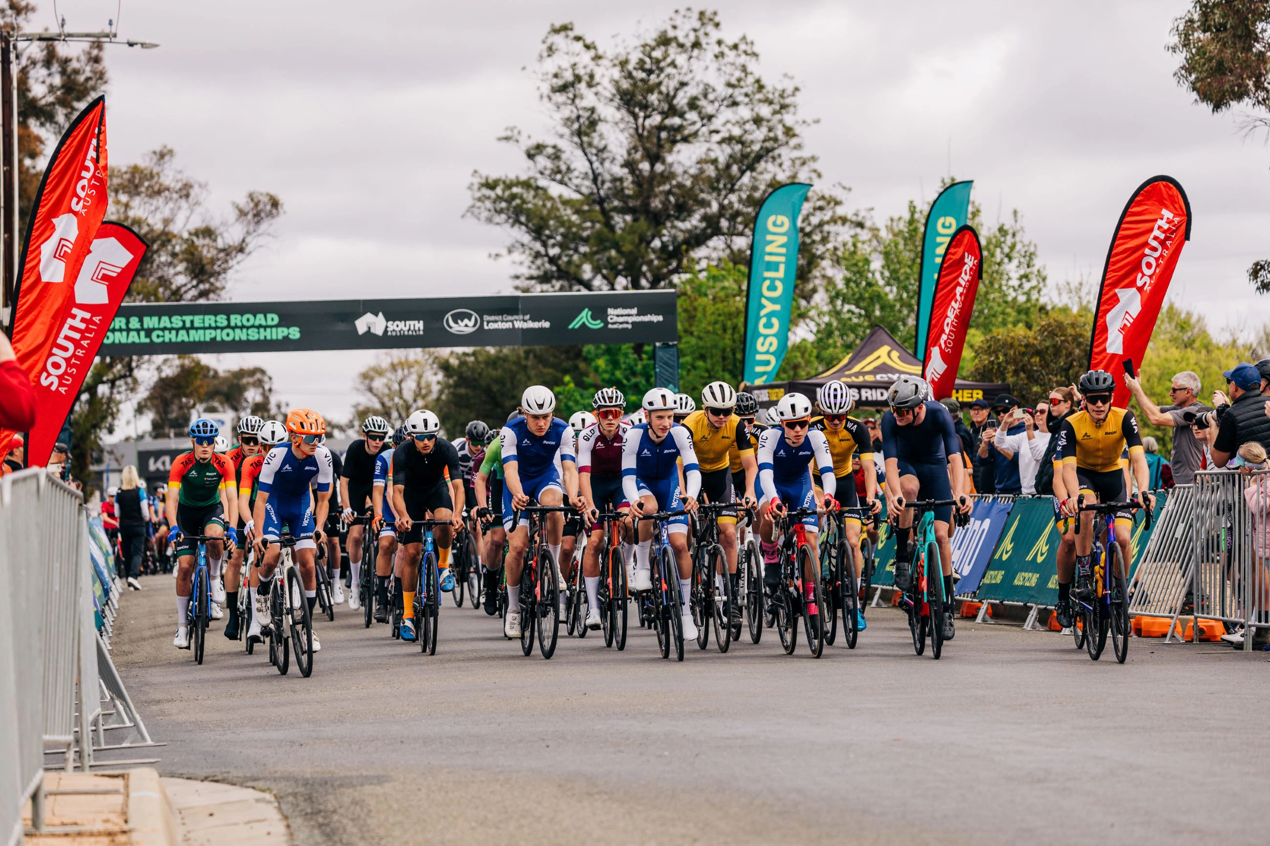 Junior Australian road cyclists begin a race at an AusCycling national event