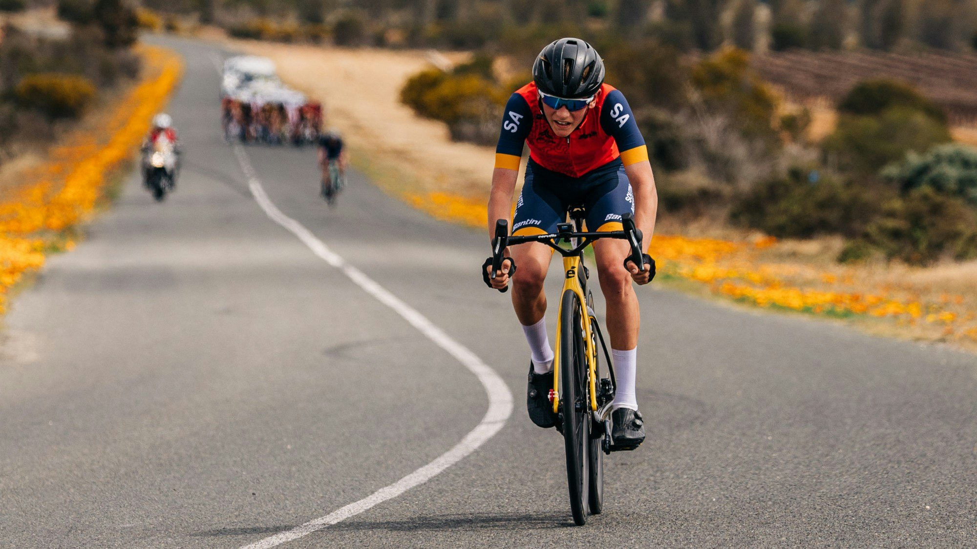 A junior road cyclist competing for South Australia (SA) during the 2024 AusCycling Masters and Junior Road National Championships in Loxton