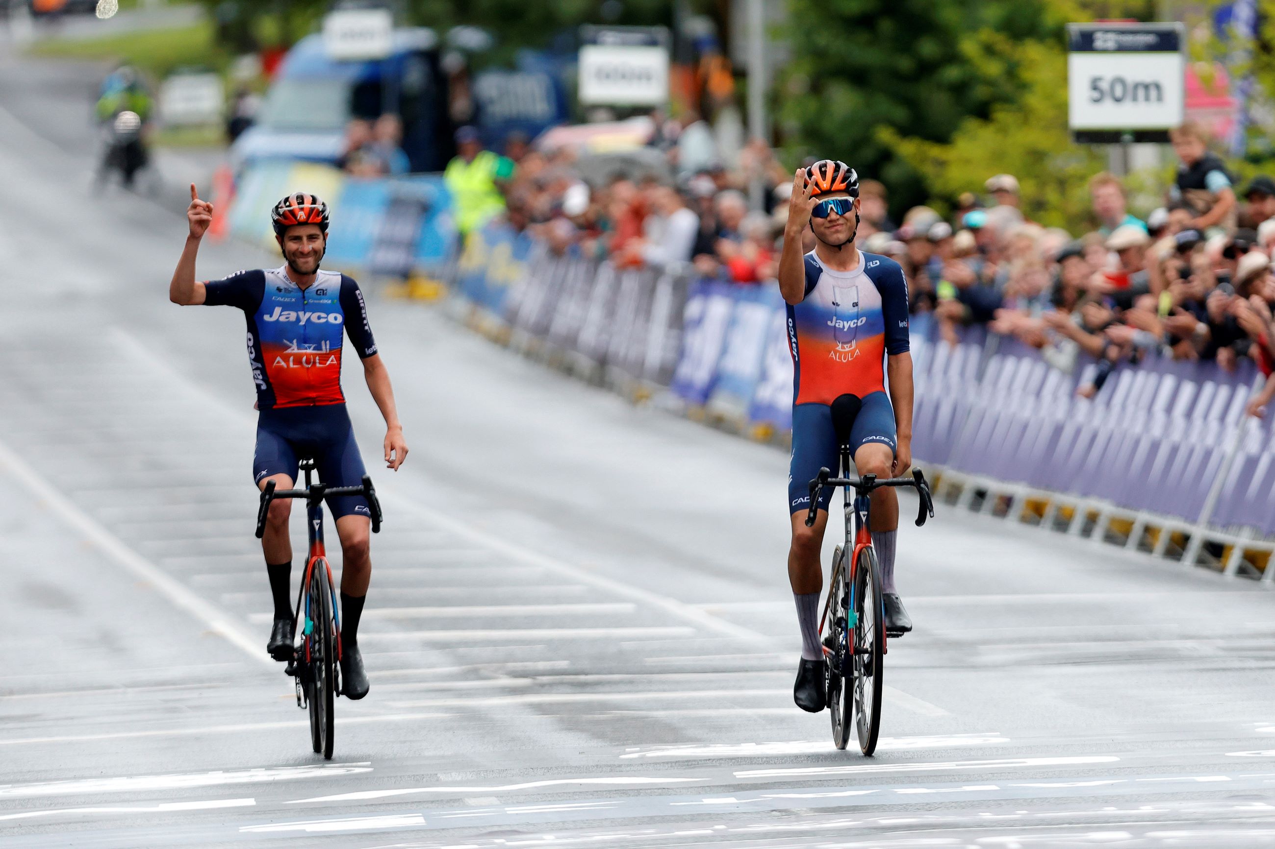 Luke Plapp and Chris Harper crossing the finish line one-two at the end of the elite men's road race in the 2024 AusCycling Road National Championships in Ballarat. Photo by Con Chronis