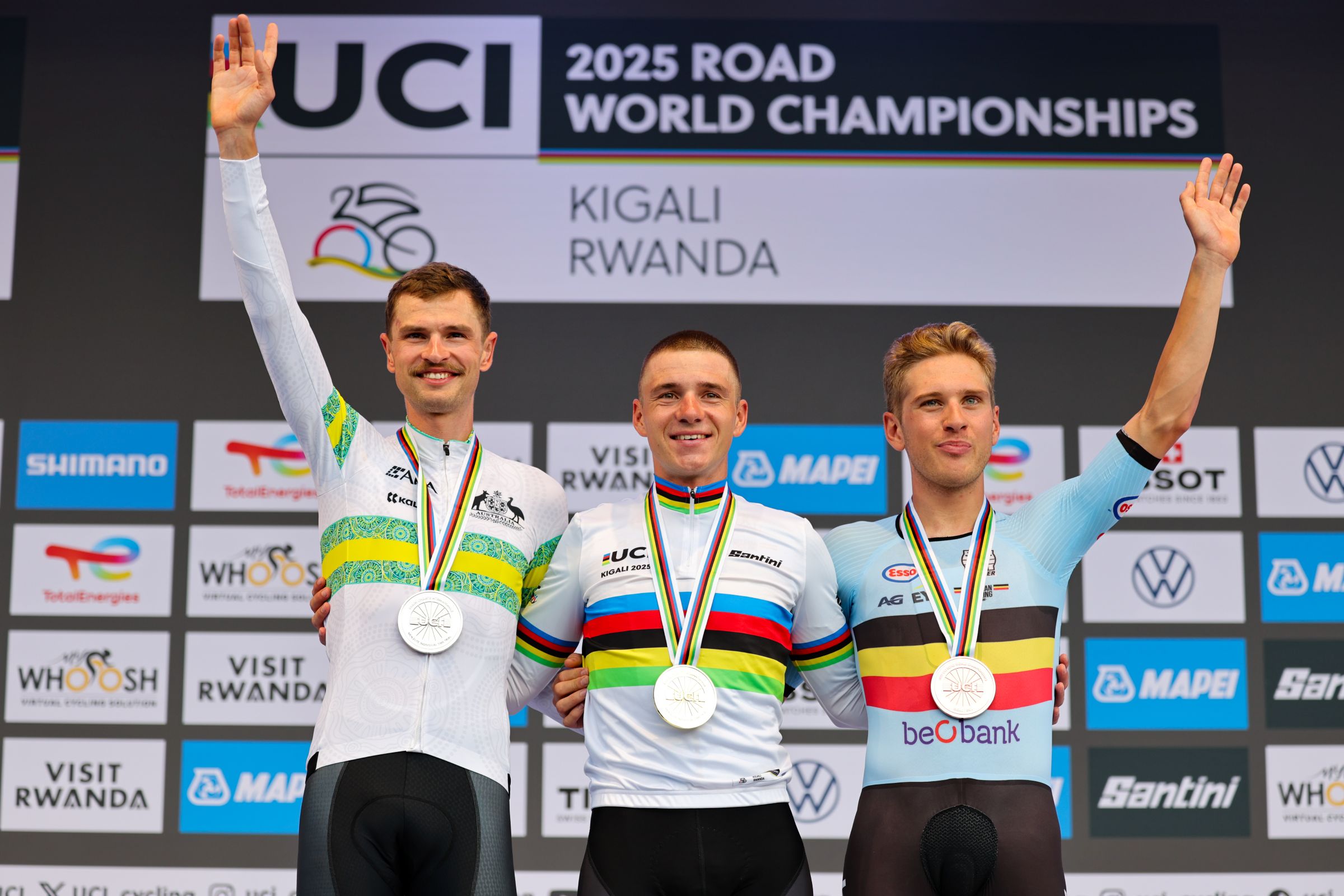 2025 UCI Road World Championships - BK Arena to Kigali Convention Centre, Kigali, Rwanda - Men Elite Individual Time Trial (ITT) Podium - Remco Evenepoel (Belgium) receiving the Gold Medal to become World Champion with Jay Vine (Australia) receiving the Silver Medal and Ilan van Wilder (Belgium) receiving the Bronze Medal