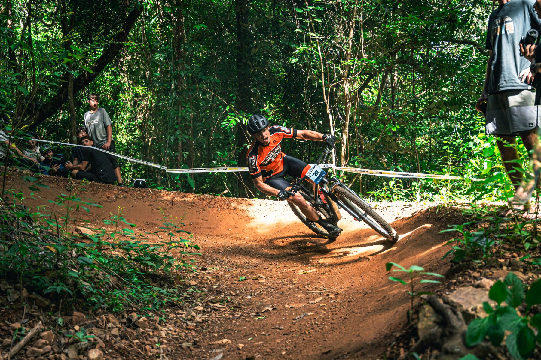 Cross-country mountain bike rider racing at Smithfield MTB Park, Cairns.