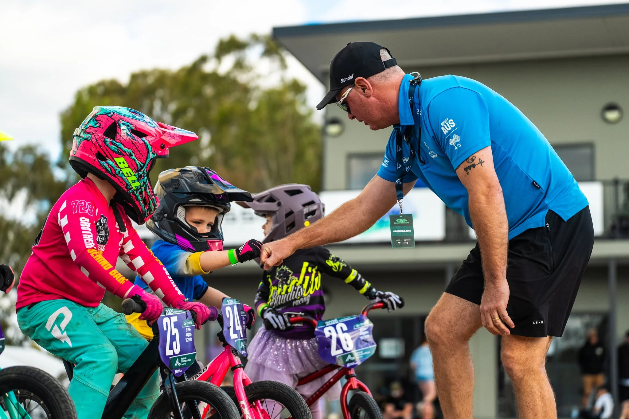 Kid bumping fist with commissaire at the 2026 GWM BMX Racing National Championships in Shepparton. Picture: Oksanen Media