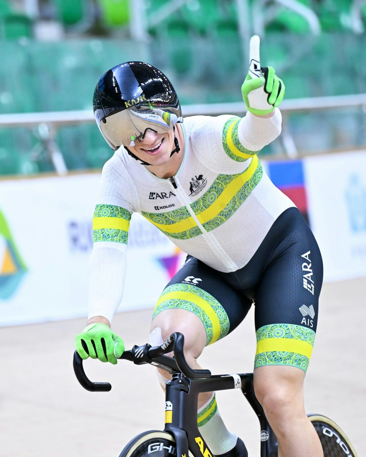 Korey Boddington celebrates with a raised finger after winning at the 2025 UCI Para-cycling Track World Championships
