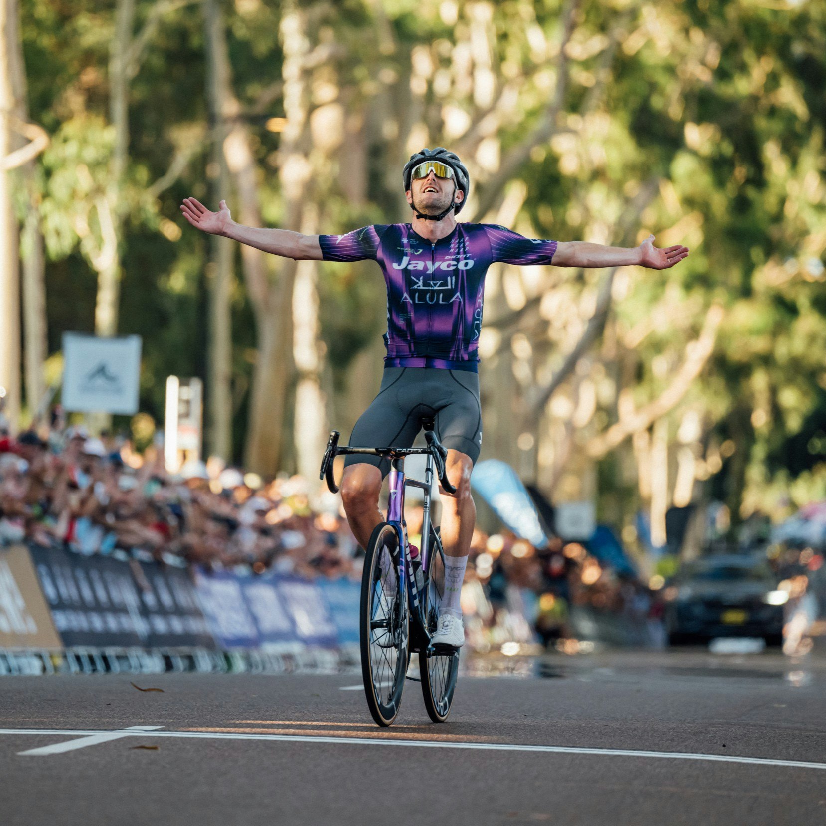 Luke Durbridge celebrates winning the elite men's road race at the 2025 AusCycling Road National Championships in Kings Park, Perth