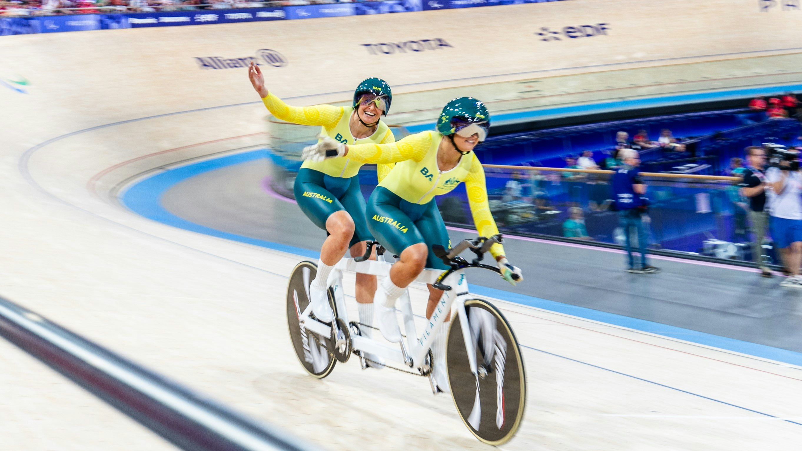 Australian para-cyclists Jessica Gallagher and Caitlin Ward celebrate winning a medal in the Tandem B vision-impaired and blind track cycling events at the Paris 2024 Paralympic Games