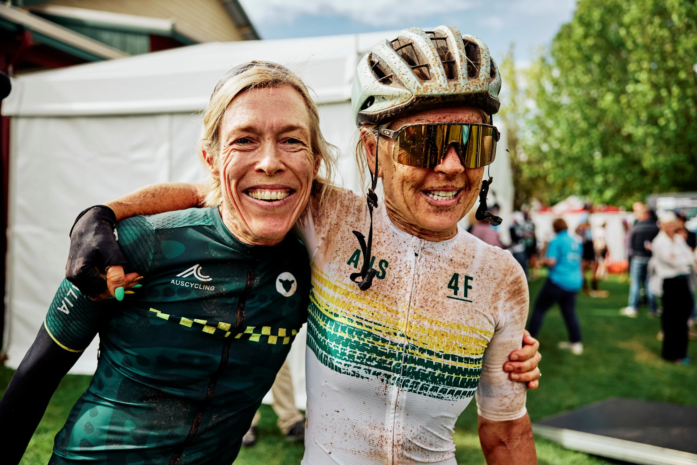 Two women cyclists representing Australia embrace after the 2026 UCI Gravel World Championships in Nannup, Western Australia