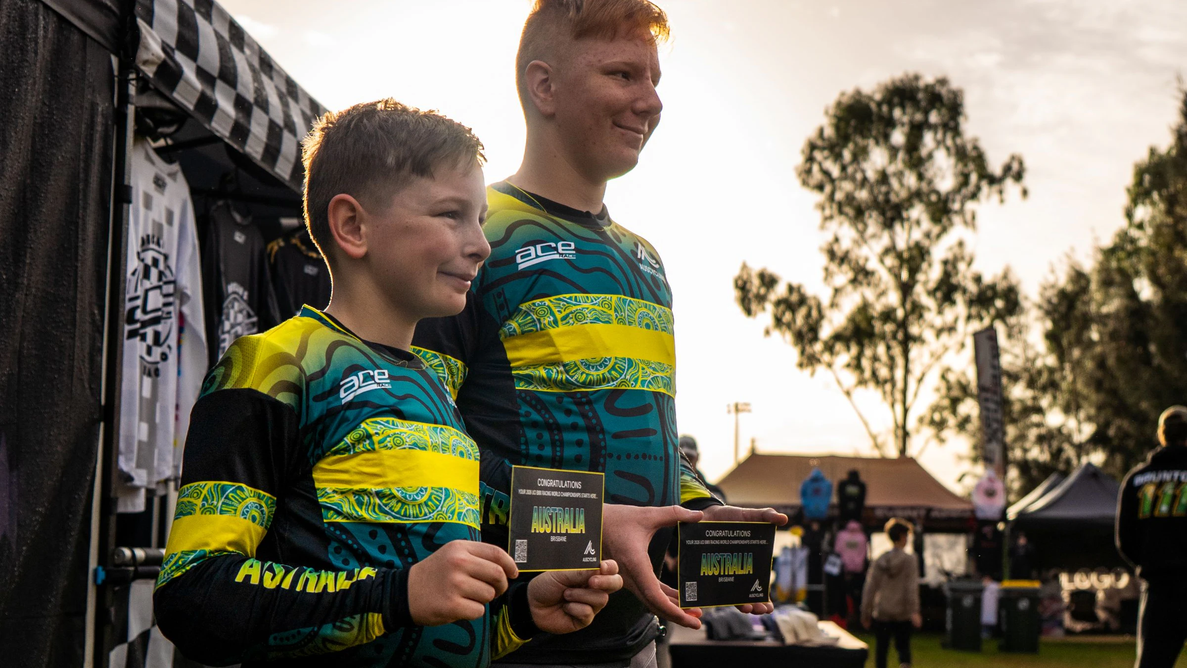 Two brothers hold their Team Australia qualifying tickets and pose after qualifying for the UCI BMX Racing World Championship Challenge at Macarthur