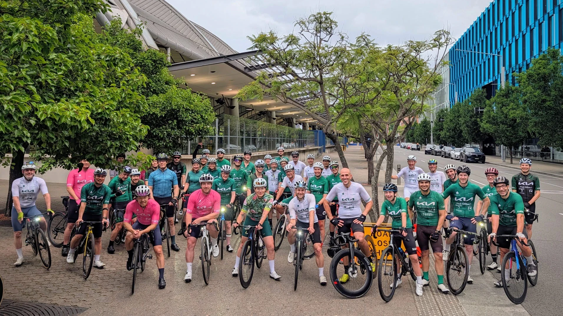 A group photography of road cyclists from Parklife Cycling Club in Sydney Olympic Park