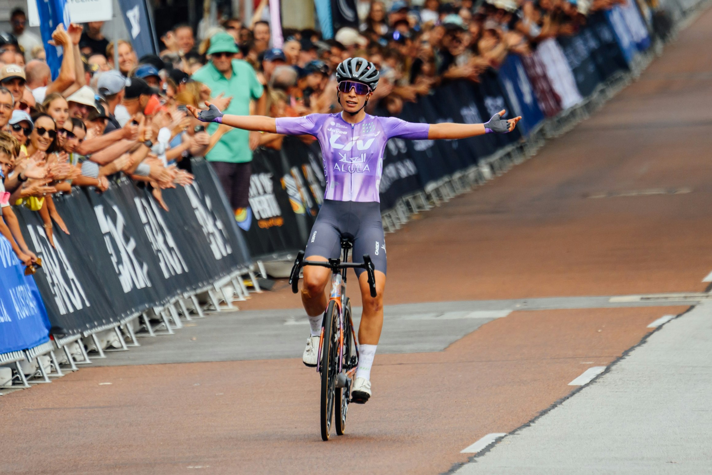 Ruby Roseman-Gannon salutes in victory n the elite women's criterium in the 2026 Westbridge Funds Road National Championships in Perth, Western Australia