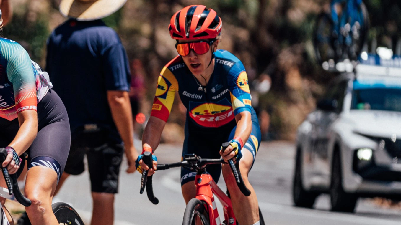 Australian cyclist Amanda Spratt representing Lidl-Trek at the 2024 Santos Tour Down Under on Willunga Hill. Photo by Zac Williams