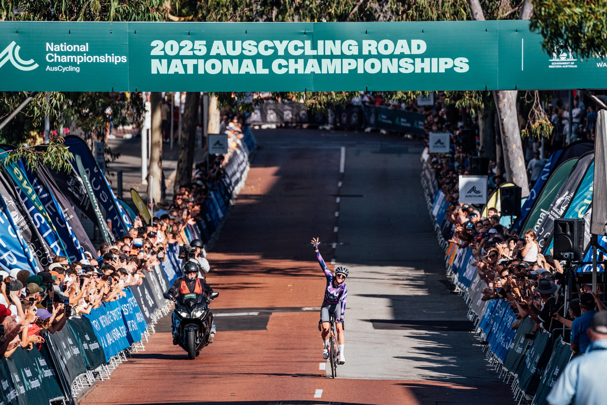 Amber Pate celebrates winning the criterium national title at the 2025 AusCycling Road National Championships in Perth. Picture: ZW Photography