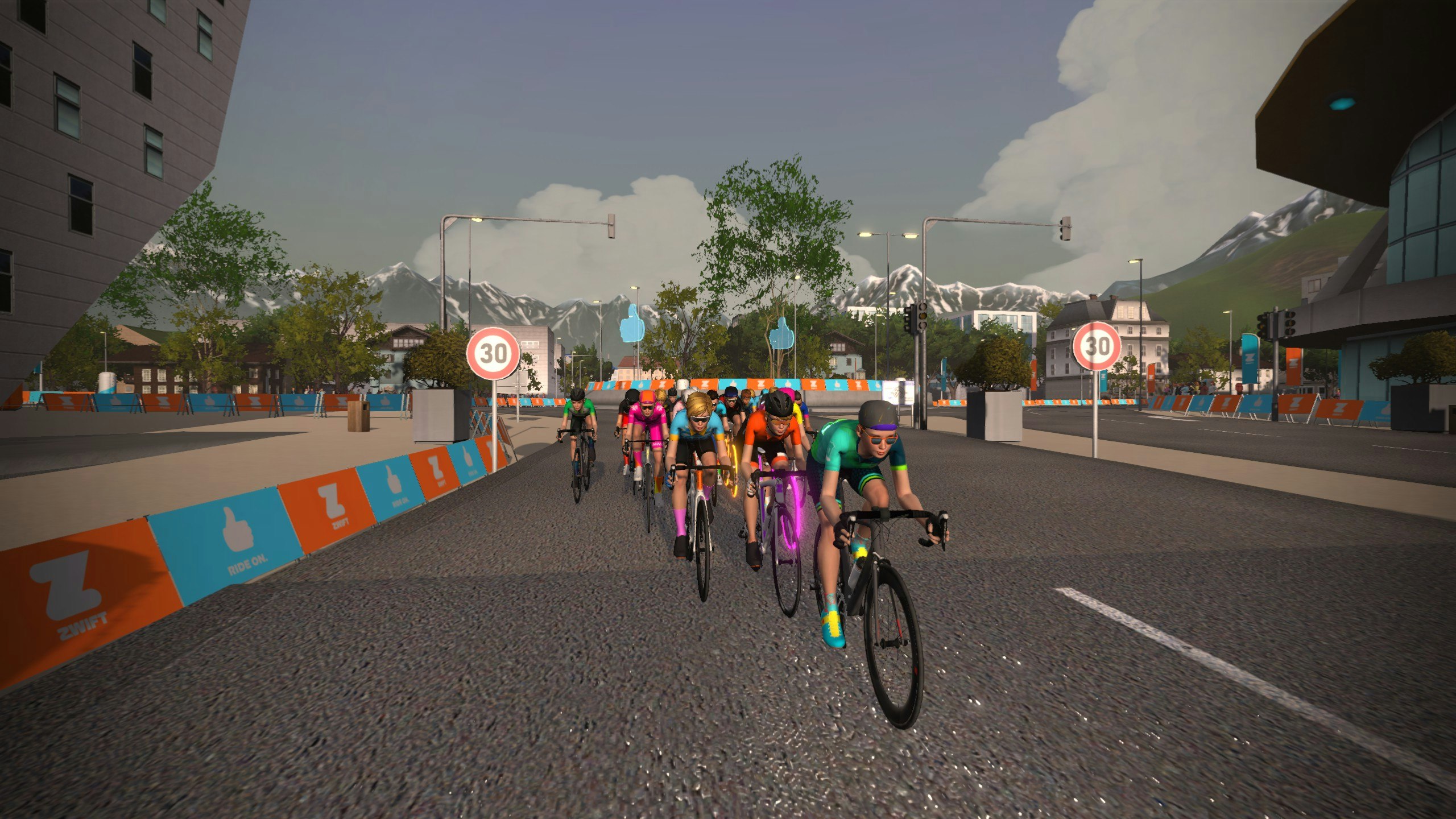 A peloton of female cyclists in Zwift on the Innsbruck course