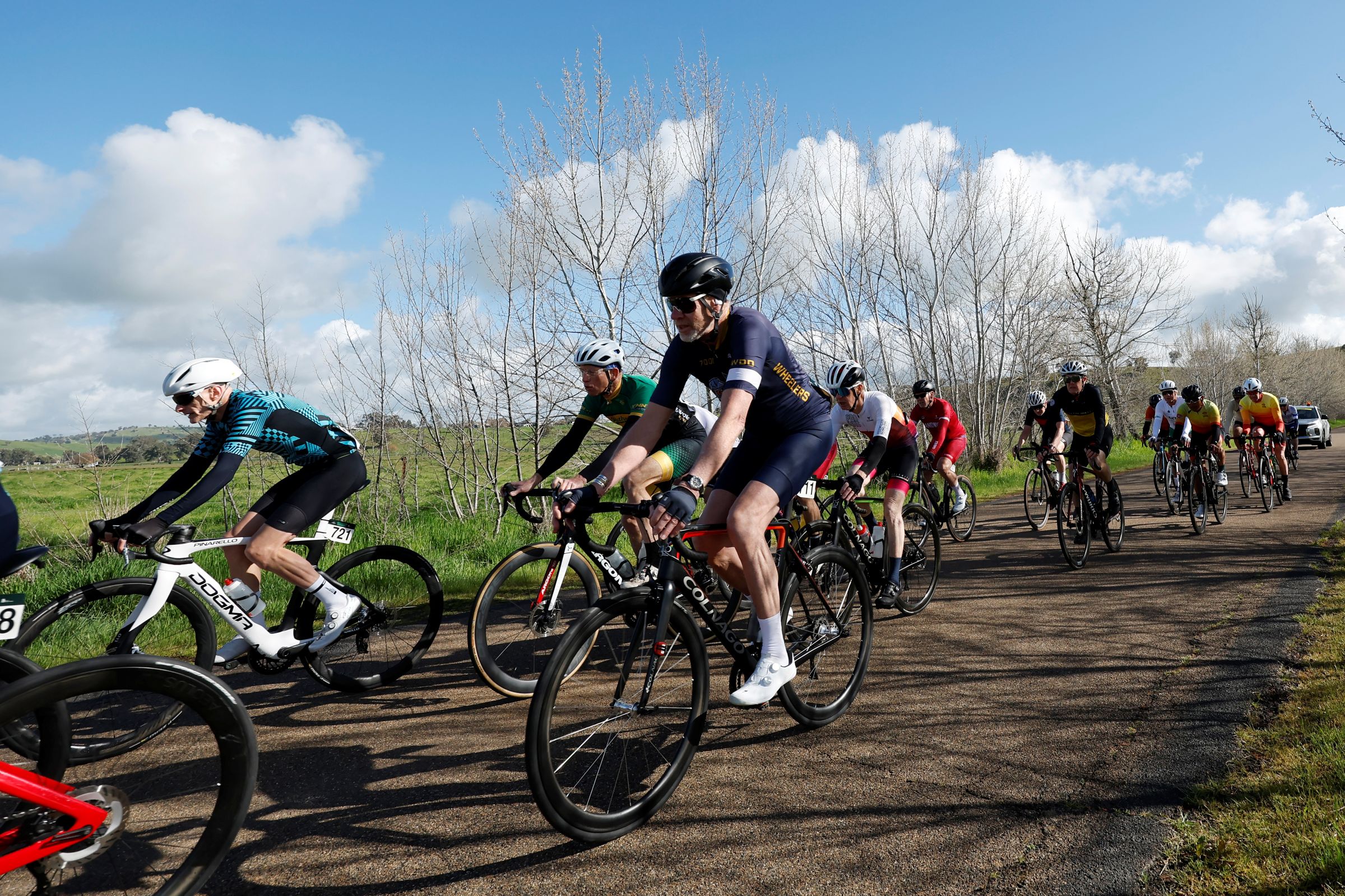 The peloton of masters men cyclists during the 2025 AusCycling Junior & Masters Road National Championships in Wagga Wagga