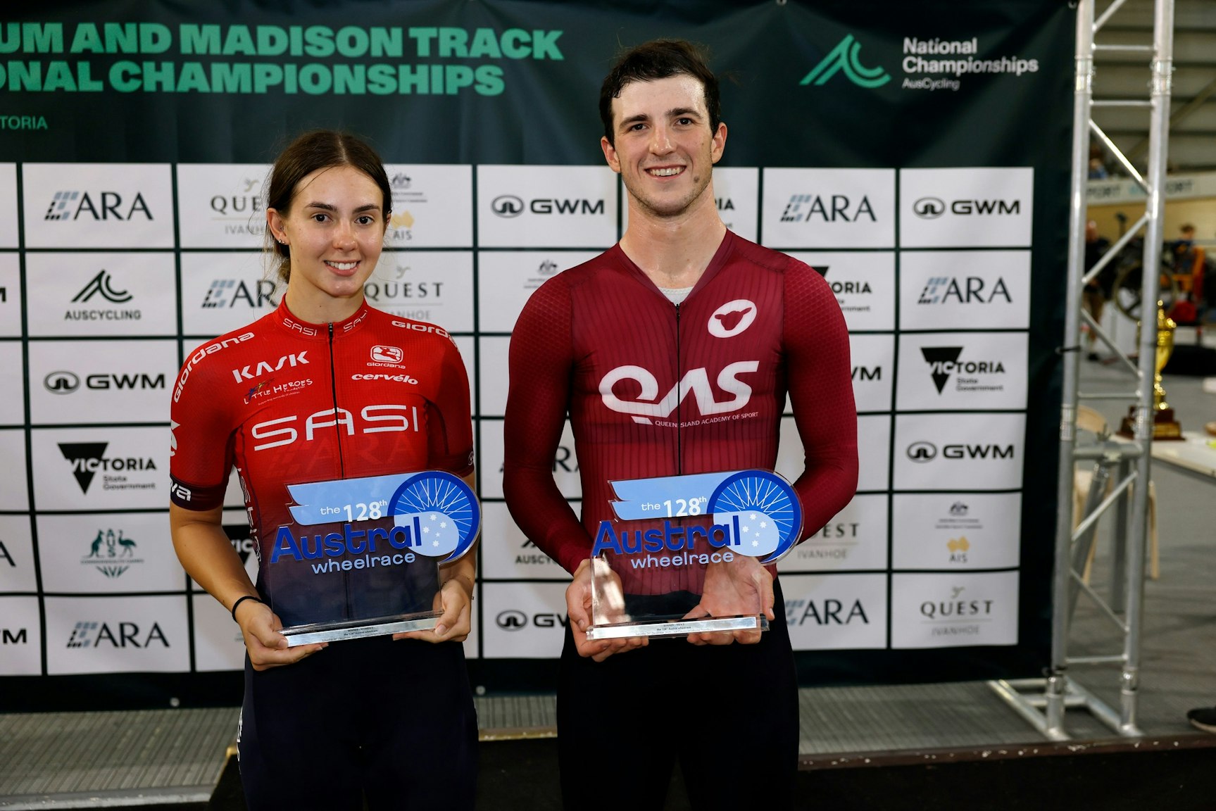 Leani van der Berg and Liam Walsh hold their trophy after winning the Quest Ivanhoe 128th Austral Wheelraces. Picture: Con Chronis