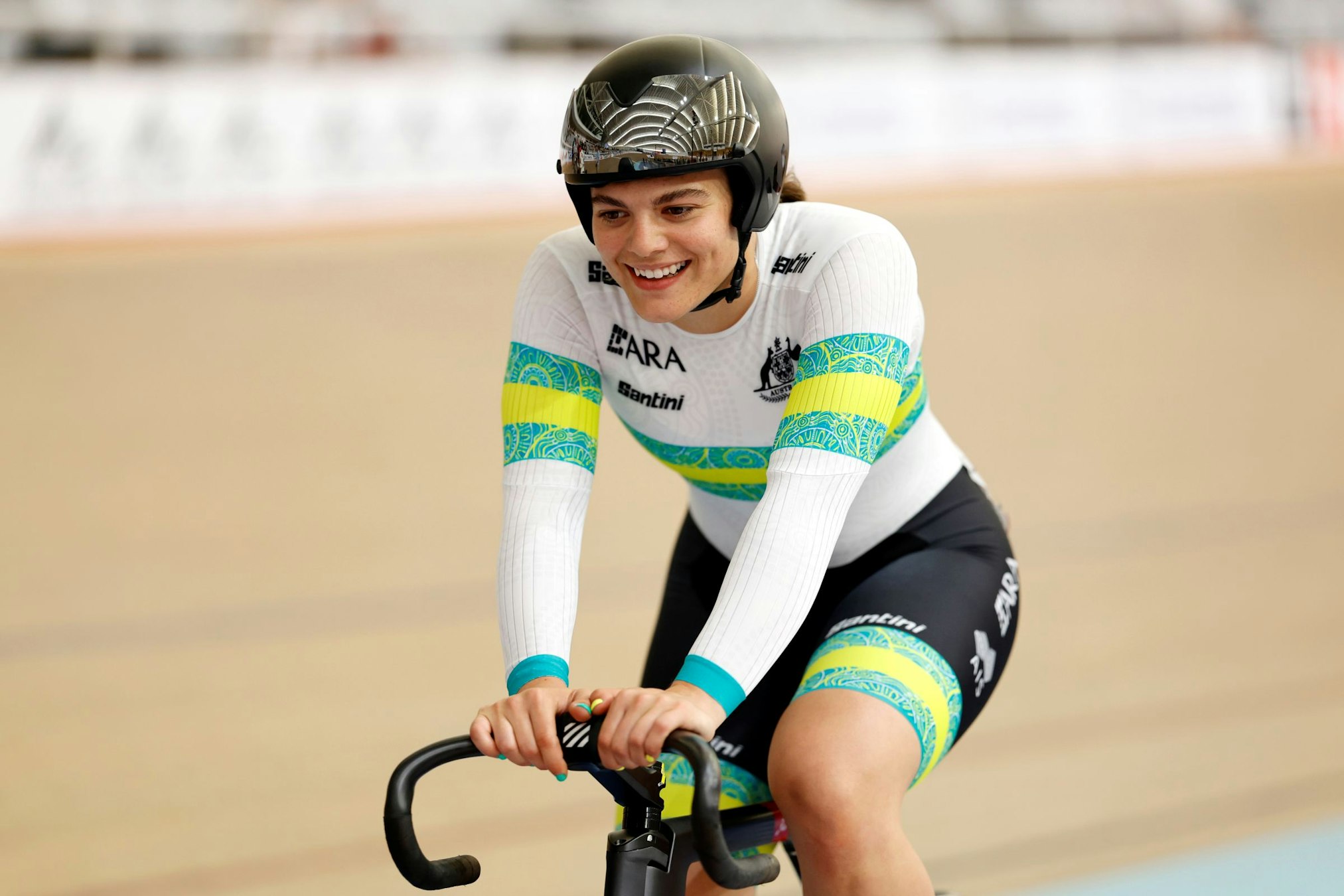 Alessia McCaig smiles after a race for the ARA Australian Cycling Team in track cycling at a UCI World Cup