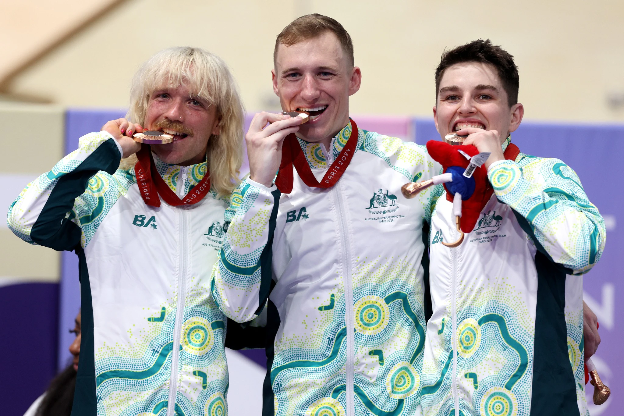 Alistair Donohoe, Korey Boddington and Gordon Allan after winning bronze in the Open C1-5 Team Sprint at the Paris 2024 Paralympic Games. Picture: Elsa/Getty Images.