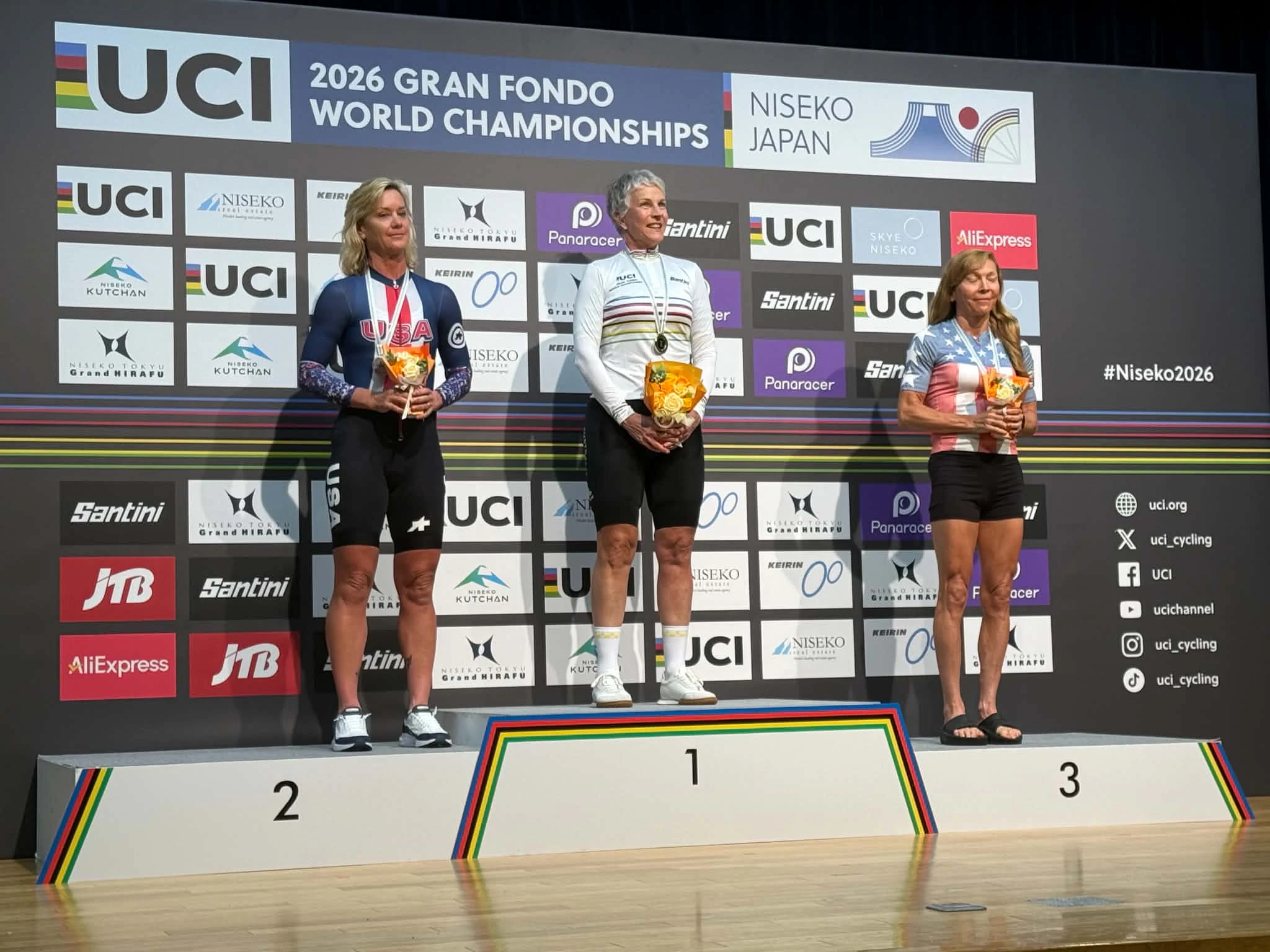 Anne Elliott of Australia in the rainbow jersey of world champion in the 2026 UCI Gran Fondo World Championships in Niseko, Japan