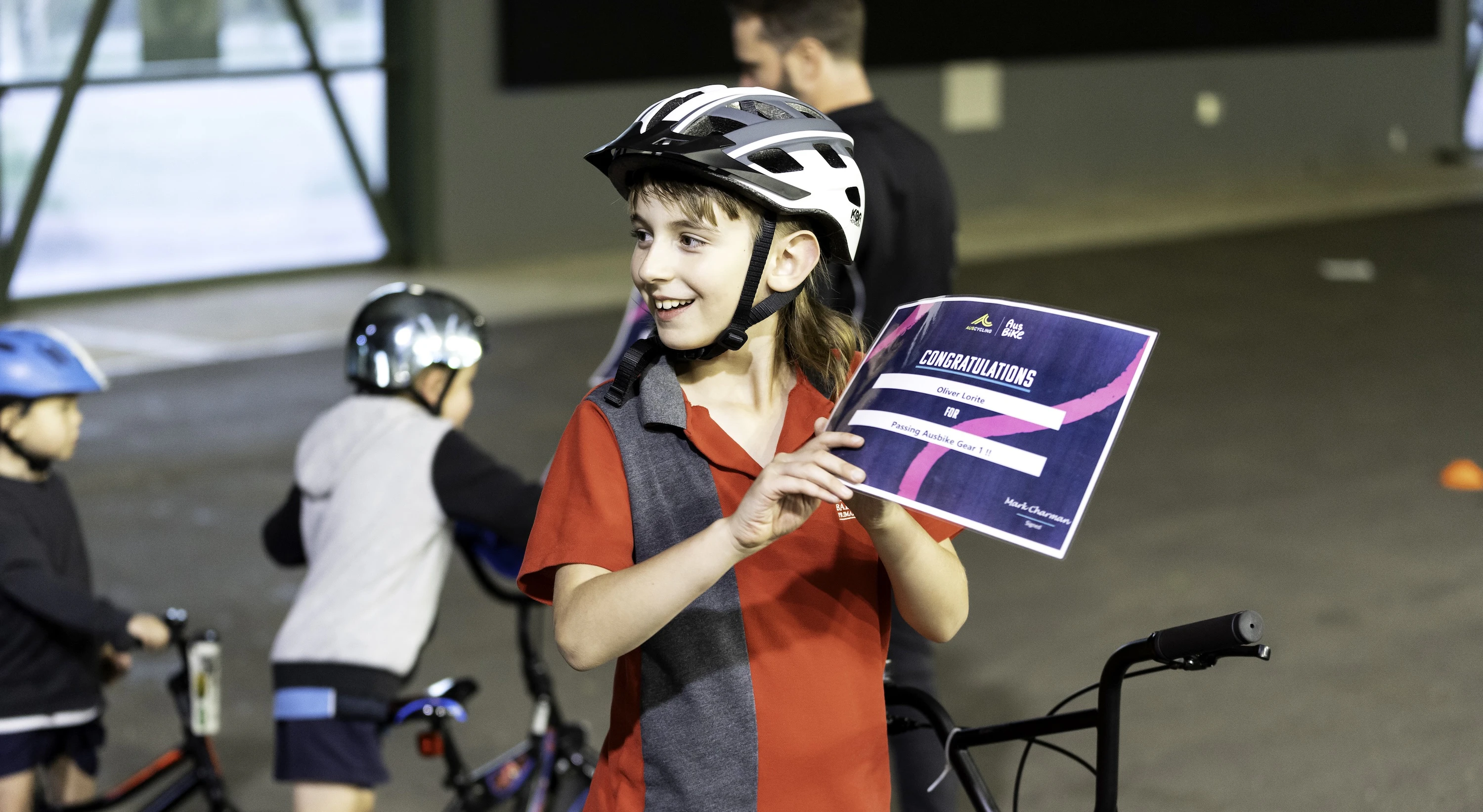 AusBike rider with certificate