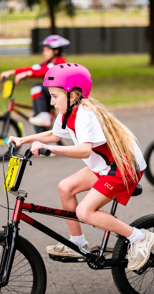 AusBike school student riding BMX bike