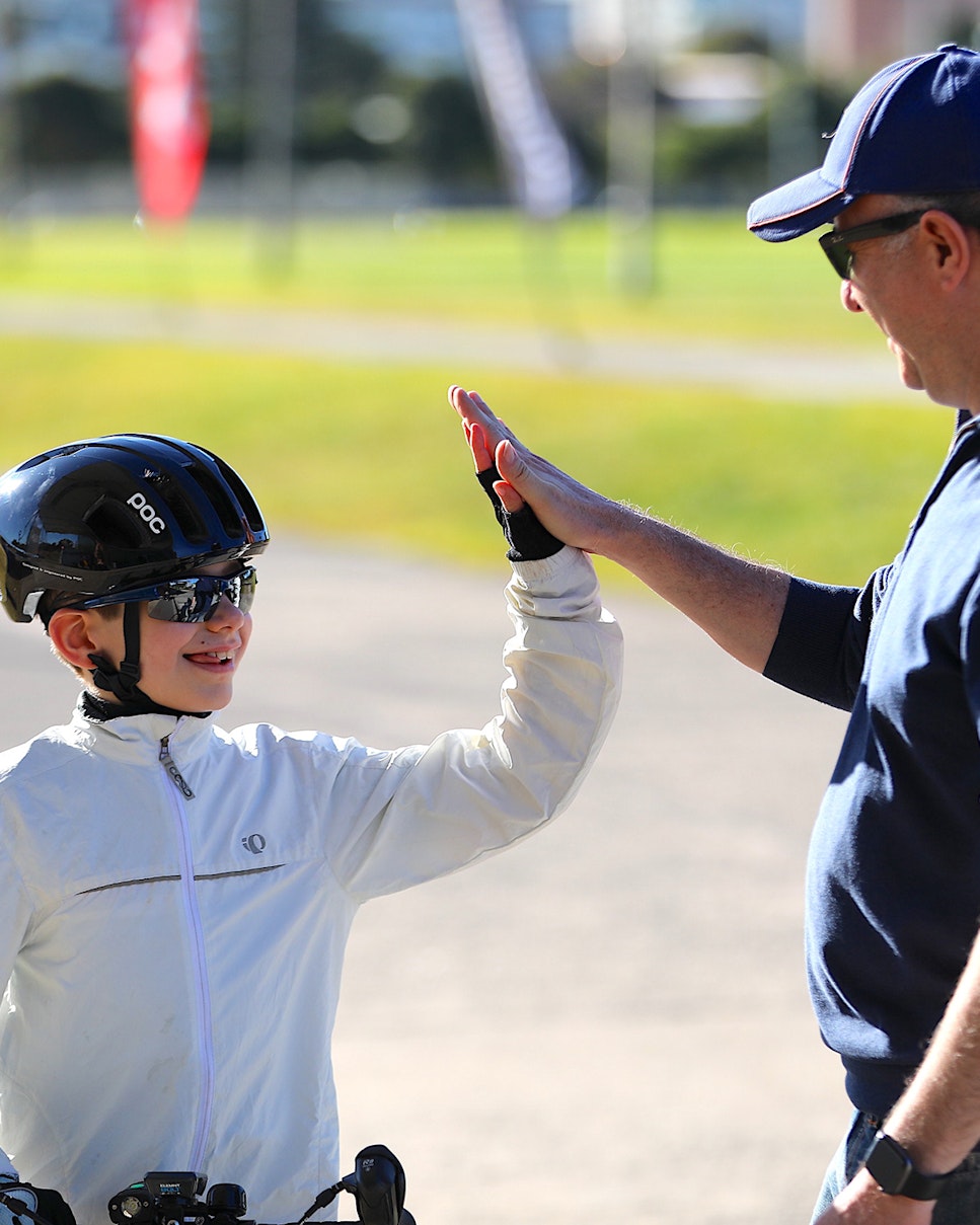 AusBike student giving high five