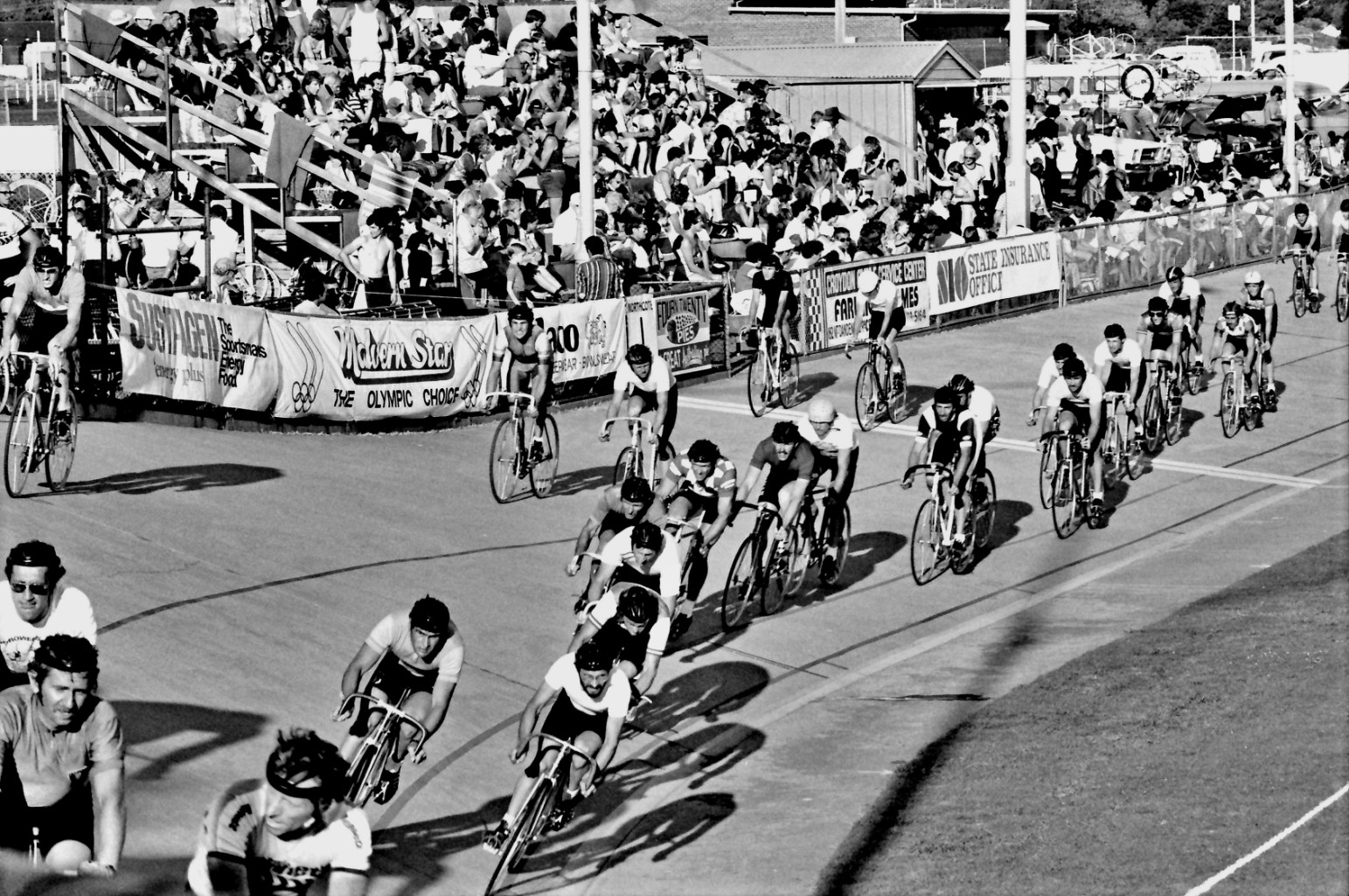 One side benefit of racing at Northcote Velodrome was the friendly atmosphere as the riders, their cars, and their family or friends were able to mix together or with others outside the track fence.