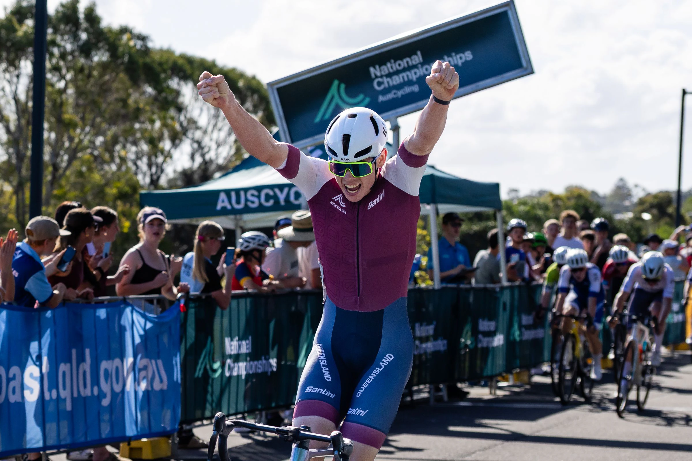 Beau Mullins celebrates winning the U17 junior men criterium at the Girraween Sports Complex at the 2026 AusCycling Junior & Masters Road National Championships on the Sunshine Coast