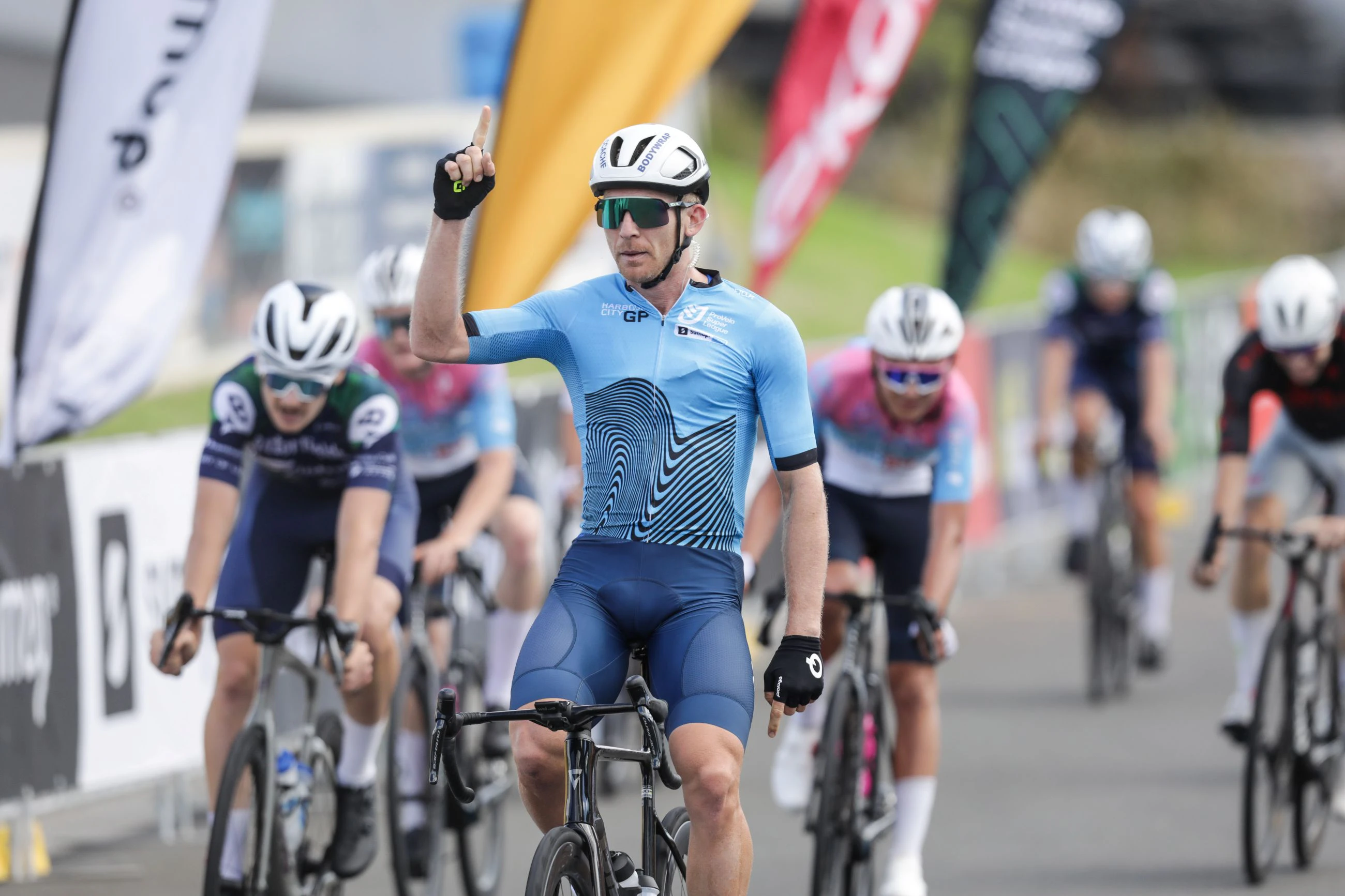 Cameron Scott of CCACHE x Bodywrap wins stage 3 of the men's Harbour City GP, part of the ProVelo Super League (PSL)