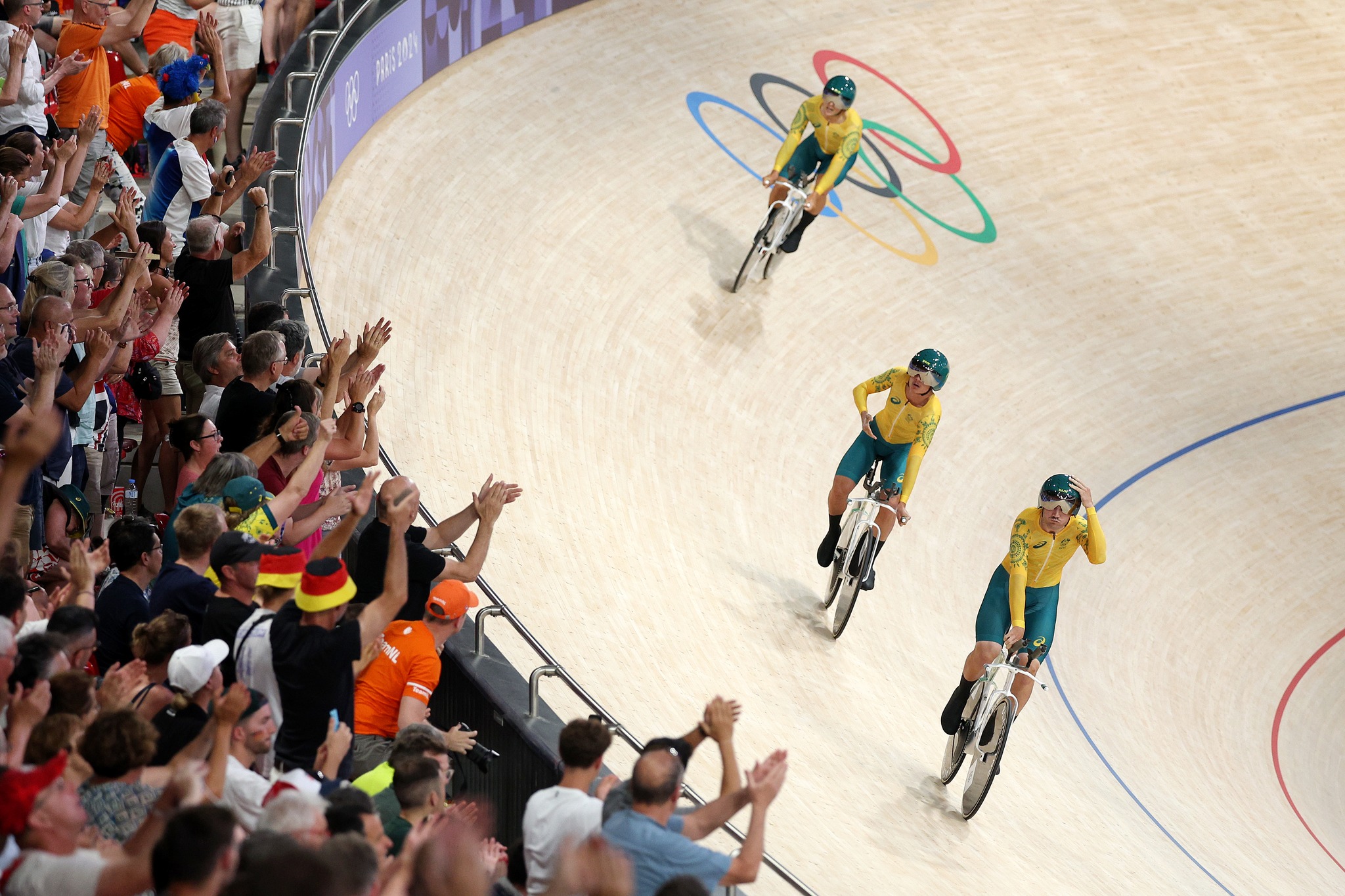 Conor Leahy, Oliver Bleddyn and Sam Welsford after breaking the world record at the Paris 2024 Olympic Games. Picture: Jared C. Tilton/Getty Images.