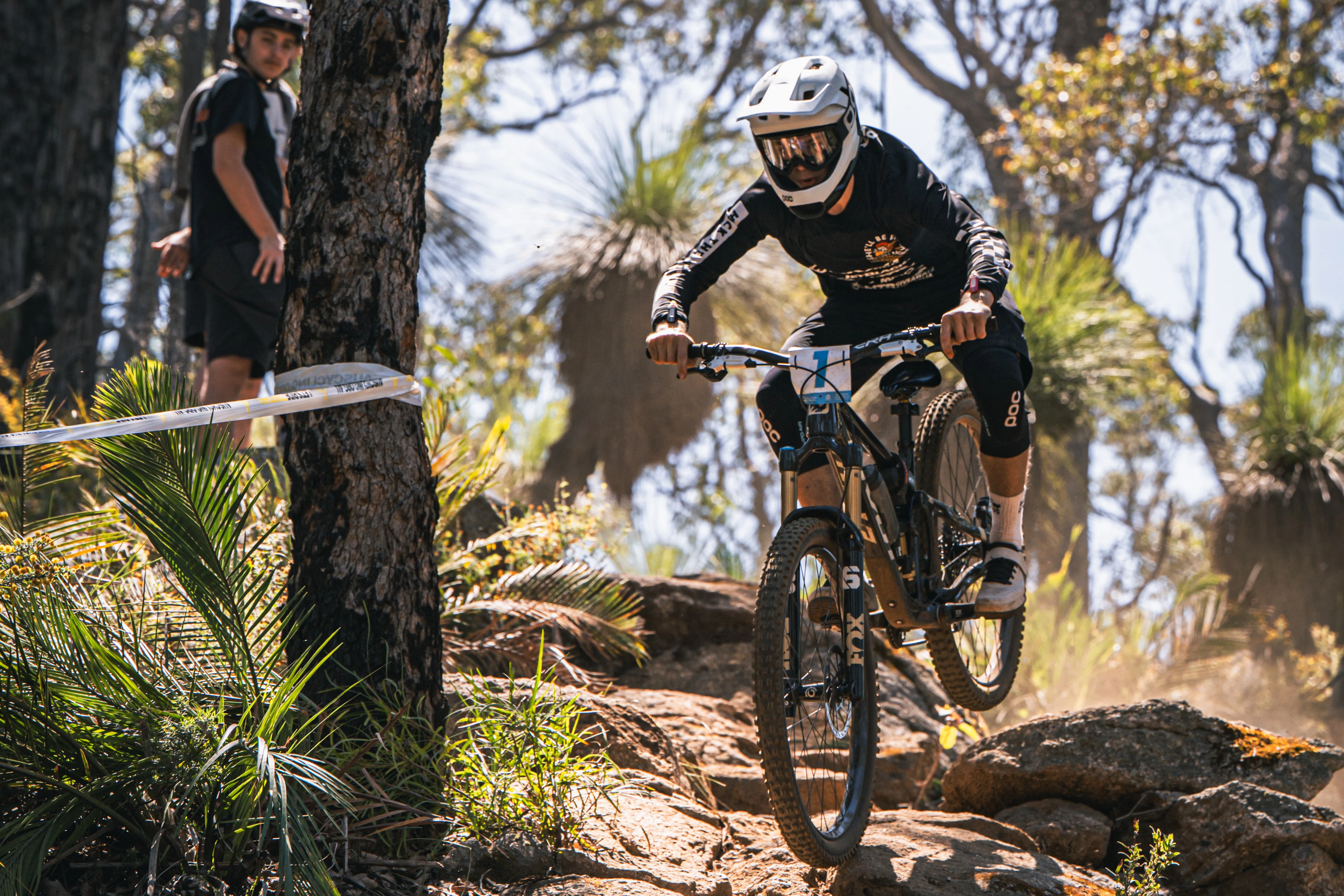 A MTB rider competes in an AusCycling mountain bike gravity enduro event