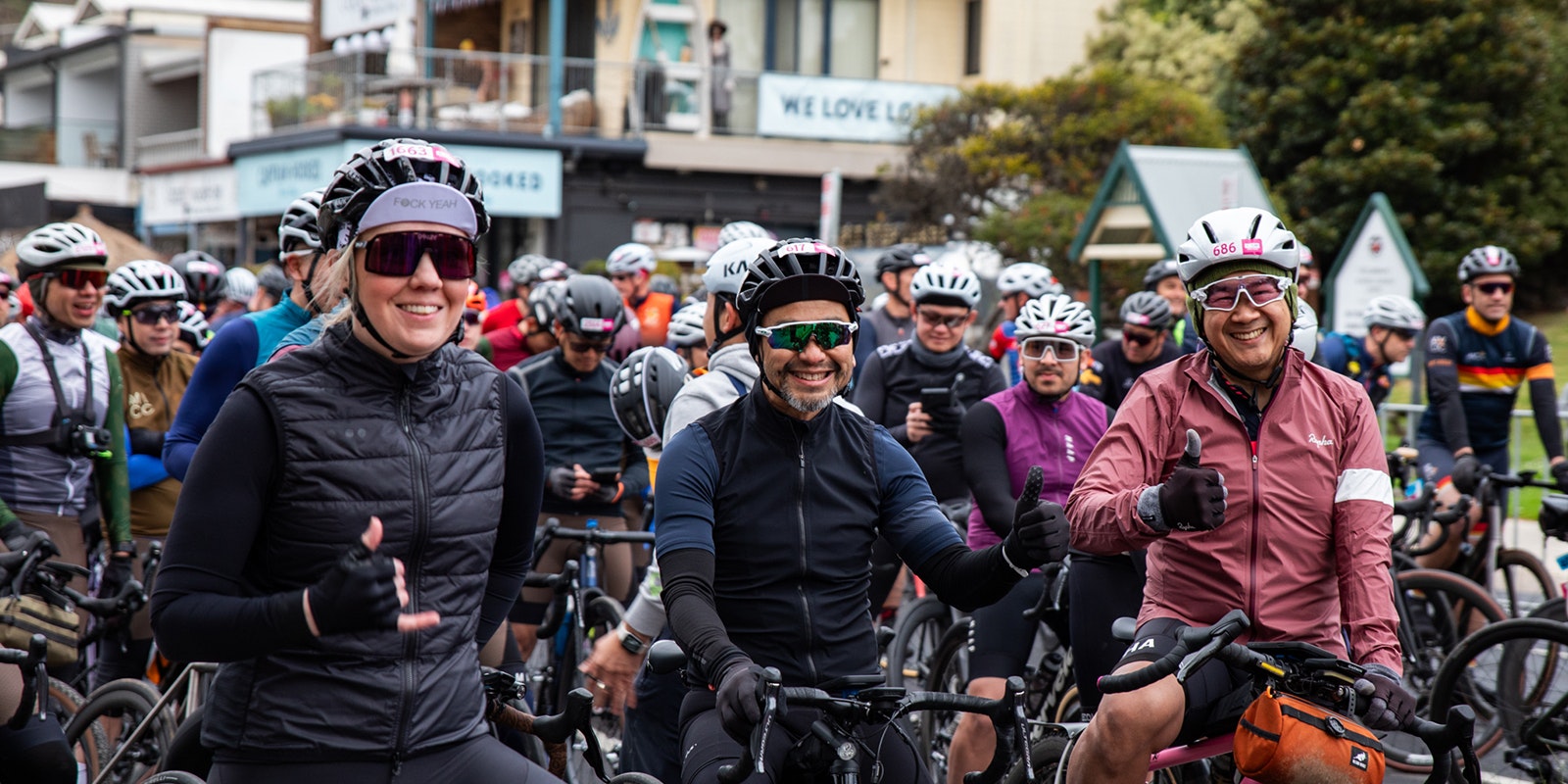 Gran Fondo cyclists giving thumbs up before race start