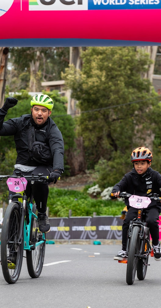Father and son riding together on Great Ocean road course