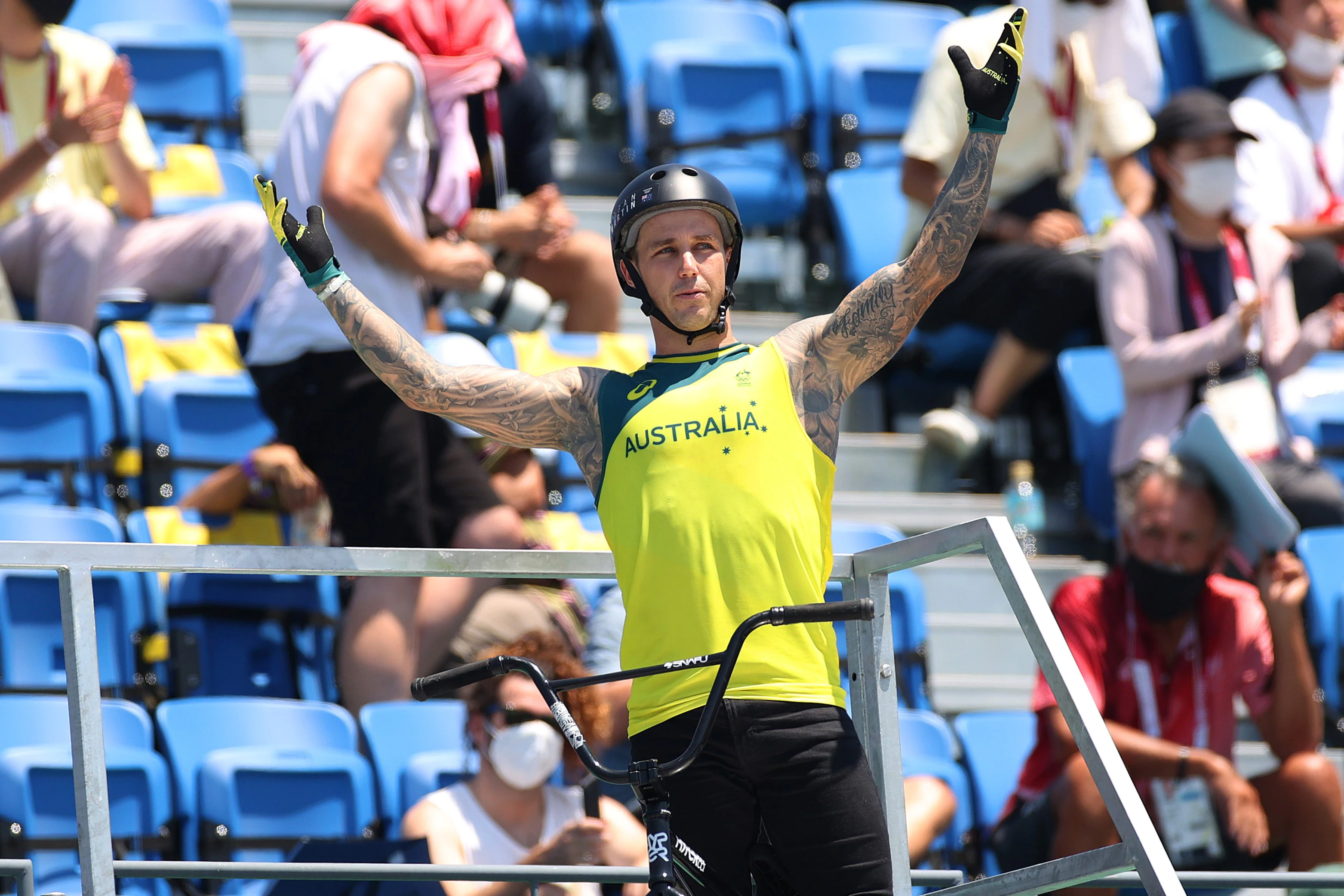 Australian BMX freestyle athlete Logan Martin celebrates with arms raised at the Tokyo 2020 Olympic Games
