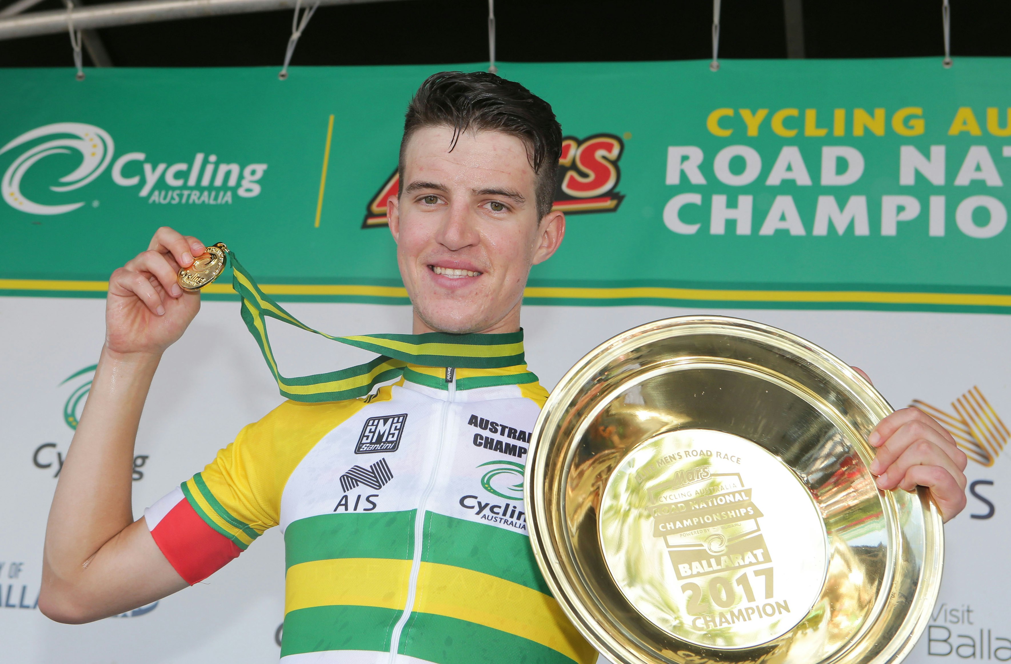 Miles Scotson celebrates after winning the 2017 elite men's road race national championships in Buninyong. Picture: John Veage