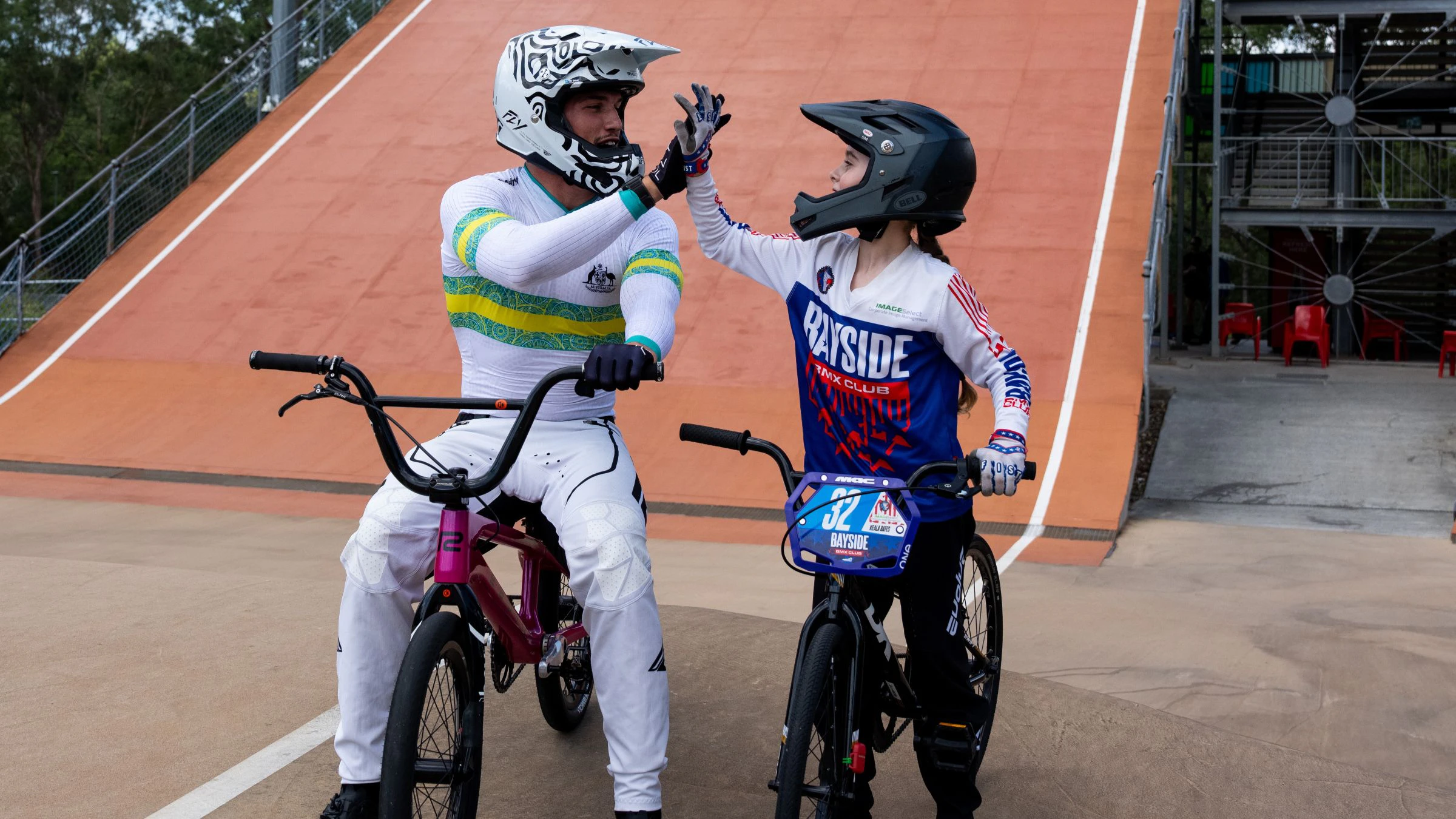 ARA Australian Cycling Team athlete Jesse Asmus and a young Australian BMX Racing fan meet before the 2026 UCI BMX Racing World Championships in Brisbane, Queensland