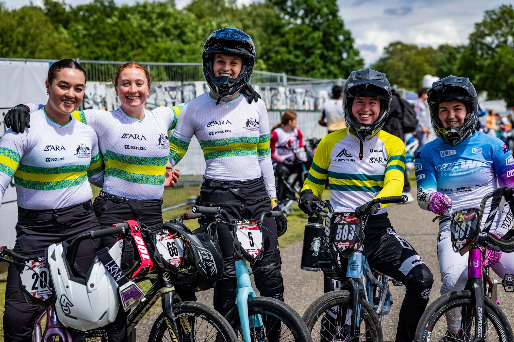 Bella May, Sienna Pal, Teya Rufus, Bella Schramm and Charli Guy, BMX Racing athletes for the ARA Australian Cycling Team, pose for a photo trackside at a UCI BMX Racing World Cup event in Papendal, Netherlands.