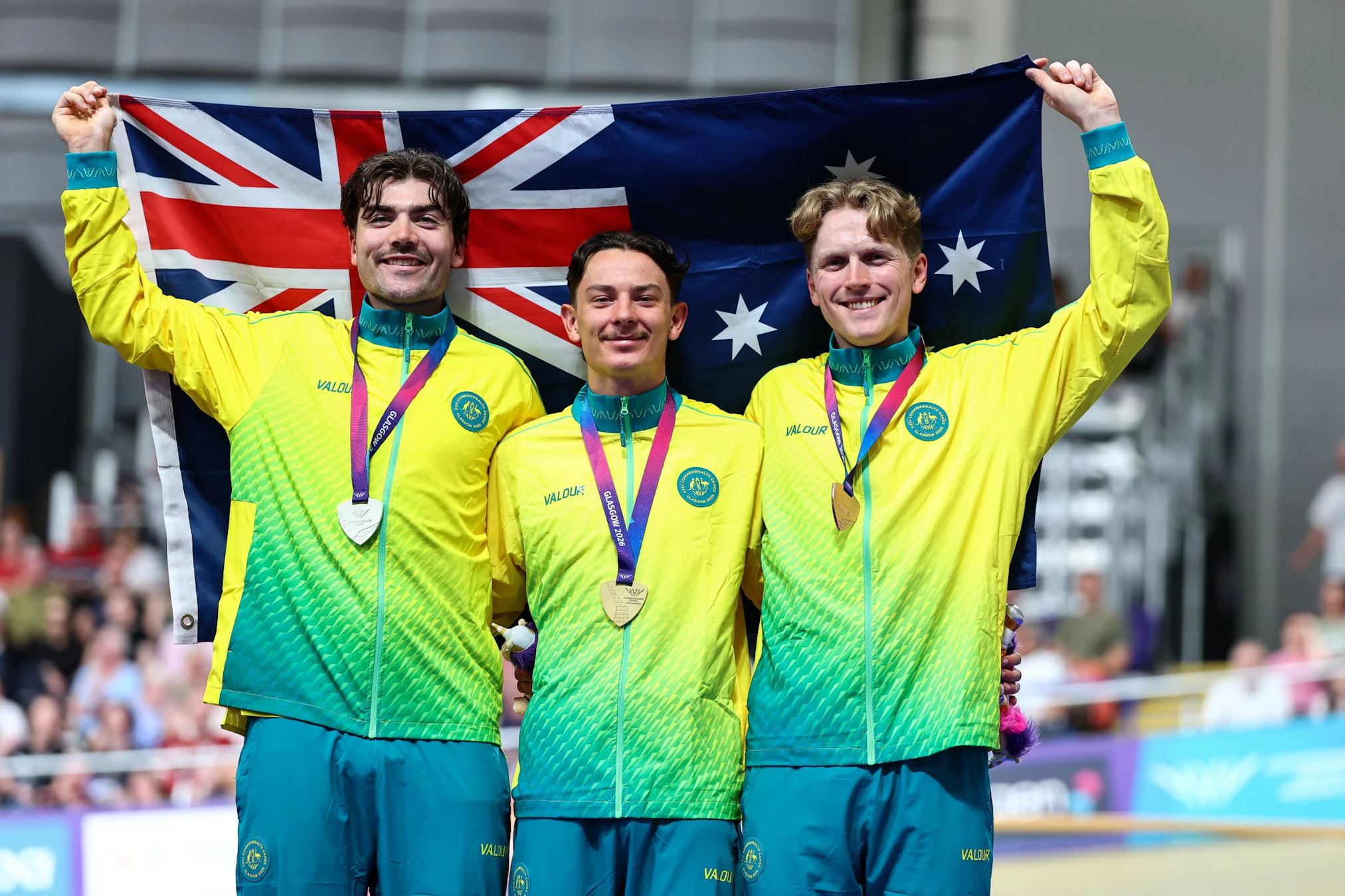 Oliver Bleddyn, Conor Leahy and James Moriarty of Australia share the podium of the men's individual pursuit at the Glasgow 2026 Commonwealth Games.