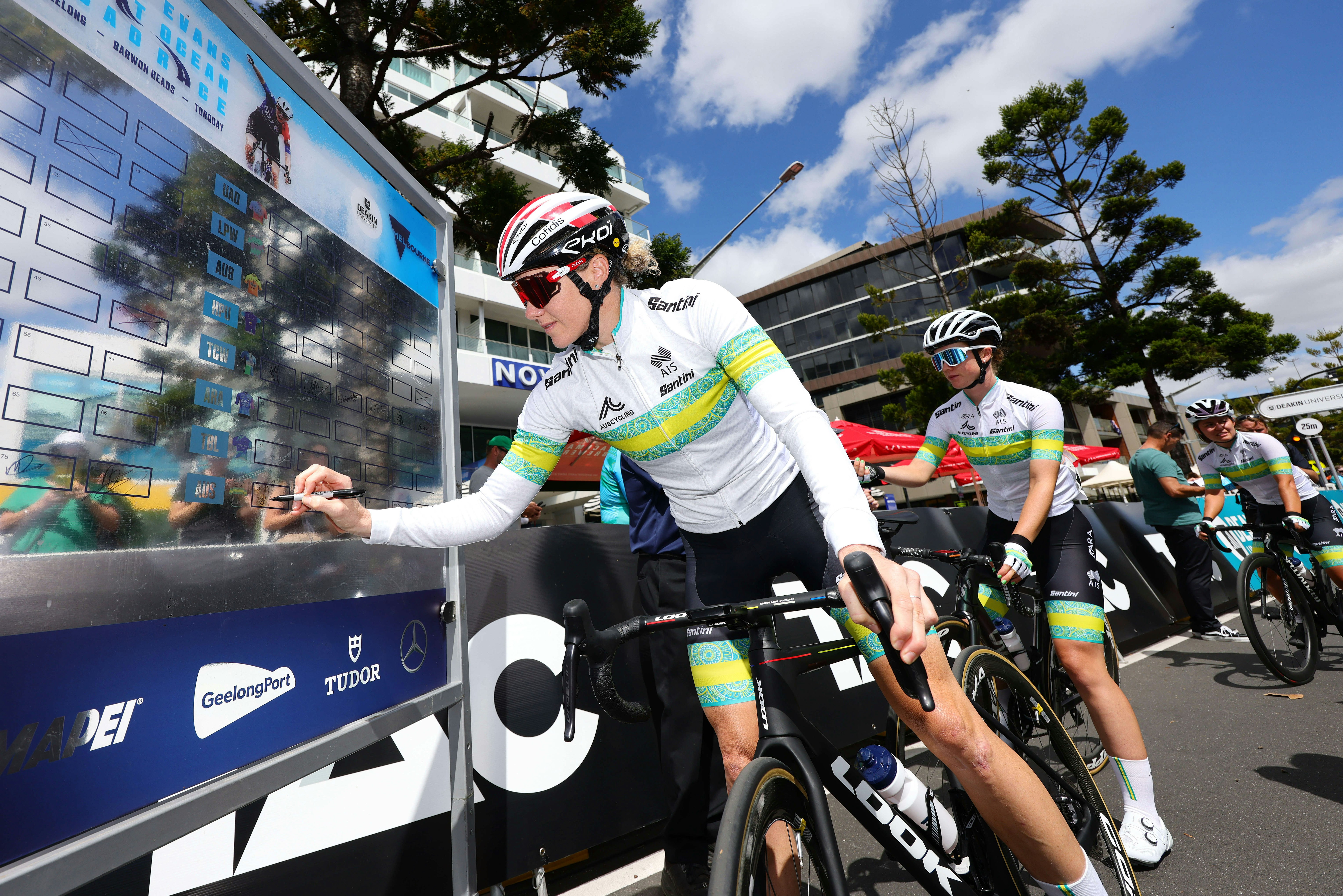 Sarah Roy signing on for the Deakin University Women's Road Race in 2024 as part of the ARA Australian Cycling Team. Picture: Con Chronis