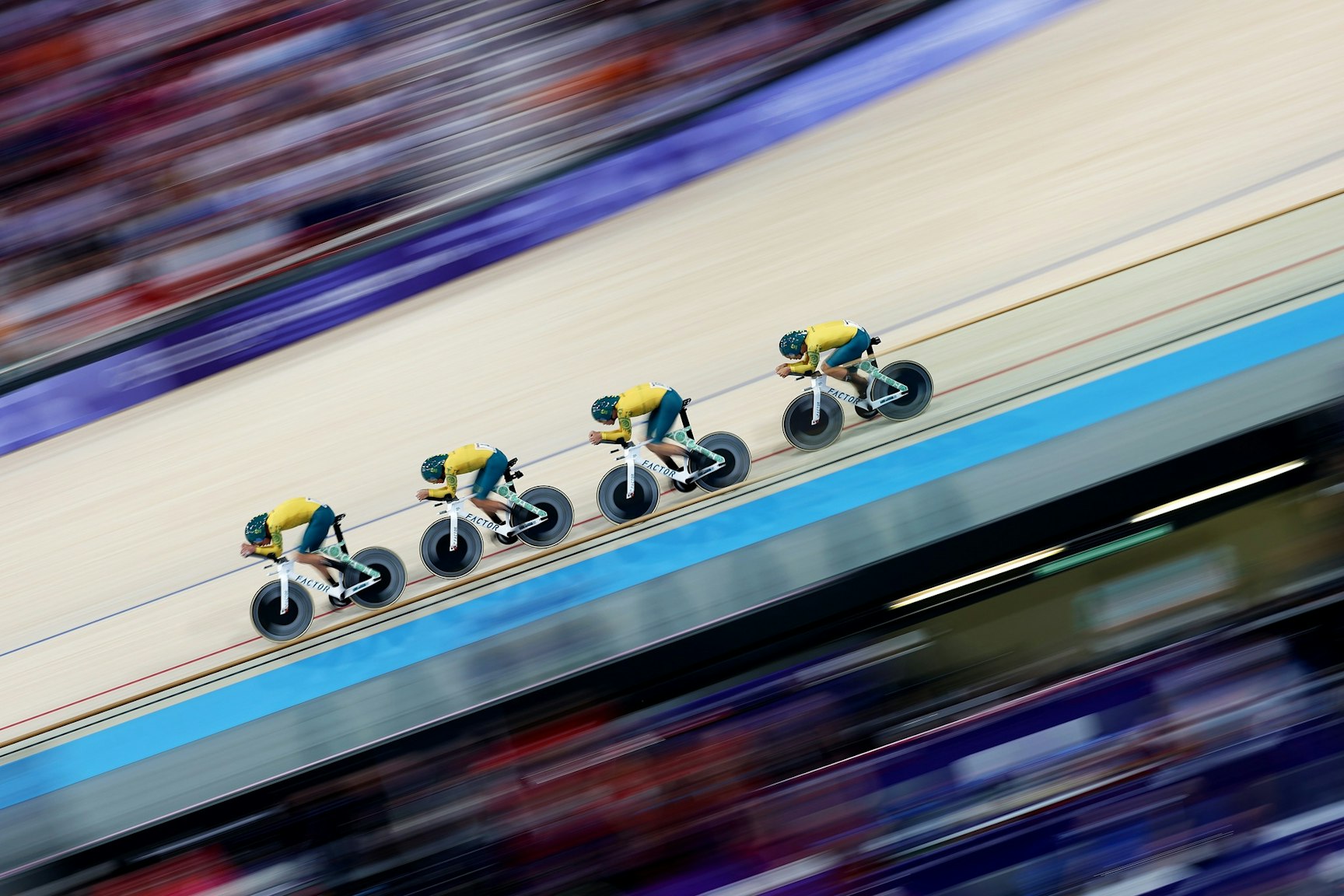Australian team pursuit men racing to first in qualifying at the Paris 2024 Olympic Games. Picture: Jared C. Tilton/Getty Images.