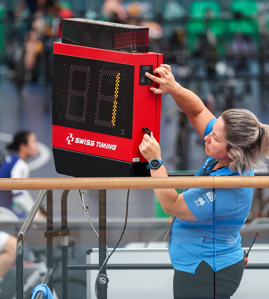 Commissaire at track nationals setting race clock