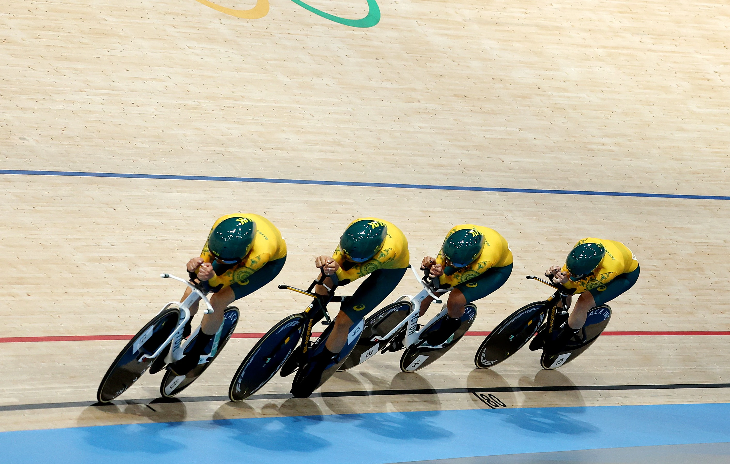 The Australian women's team pursuit cyclists Georgia Baker, Maeve Plouffe, Chloe Moran and Sophie Edwards racing at the Paris 2024 Olympic Games.
